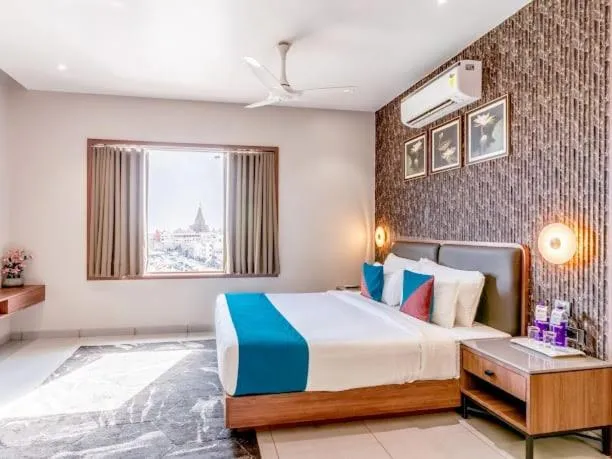 Photo of the whole room, Bed in Pride Elite Dwarka Near Dwarkadhish Temple