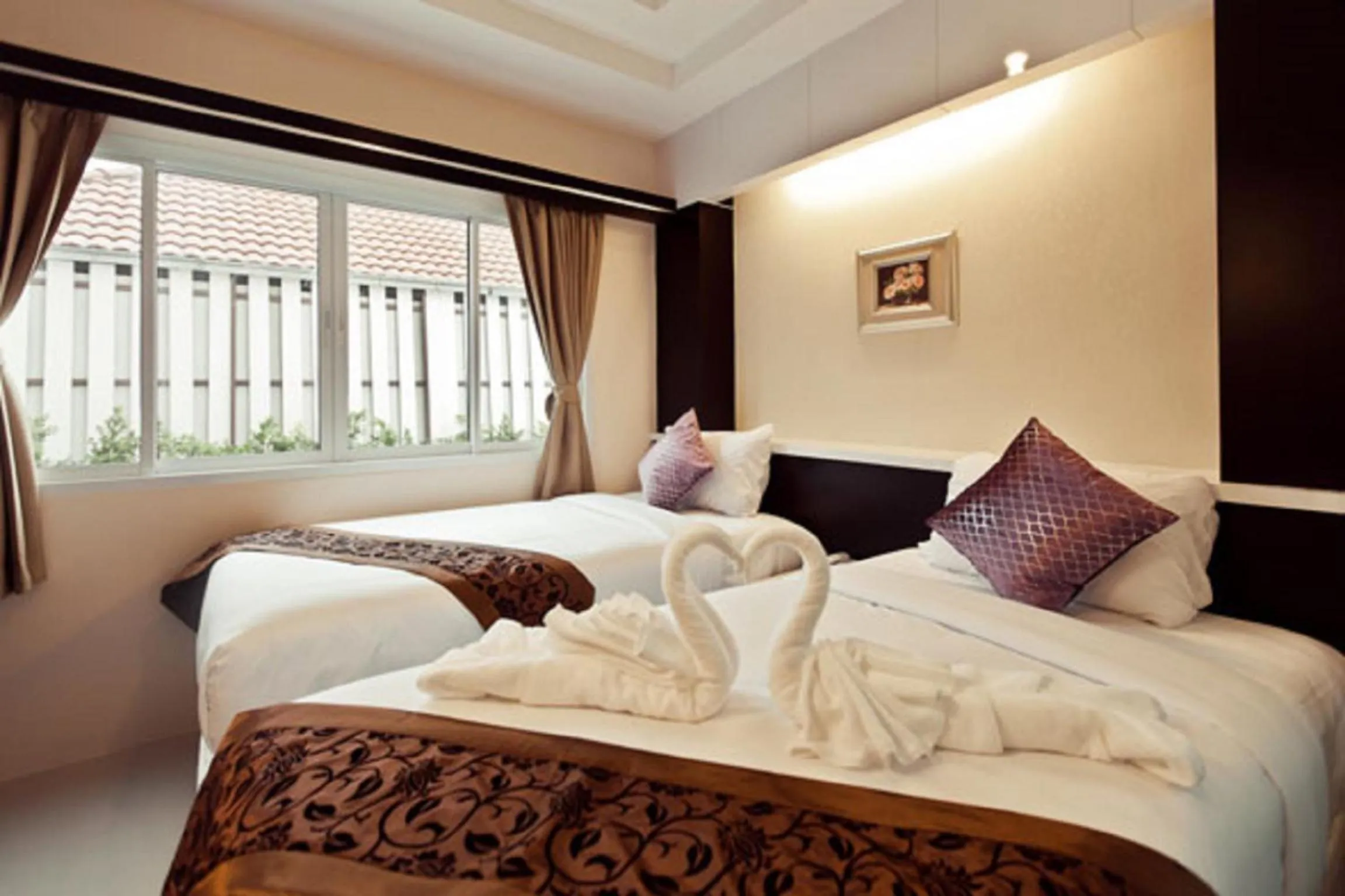 Bed in Excella Hotel