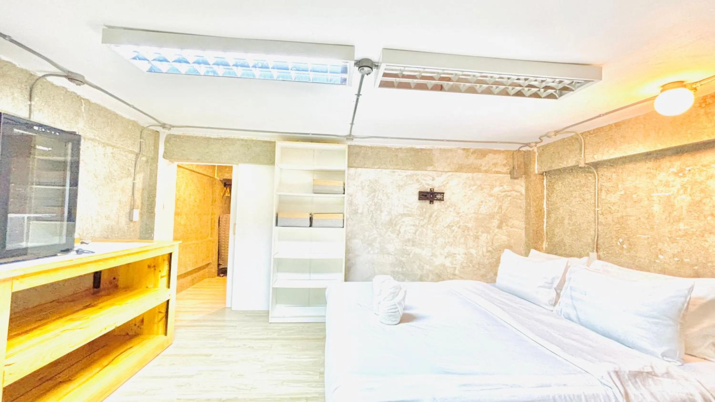 Bed in The Yak Cozy Chiang Mai