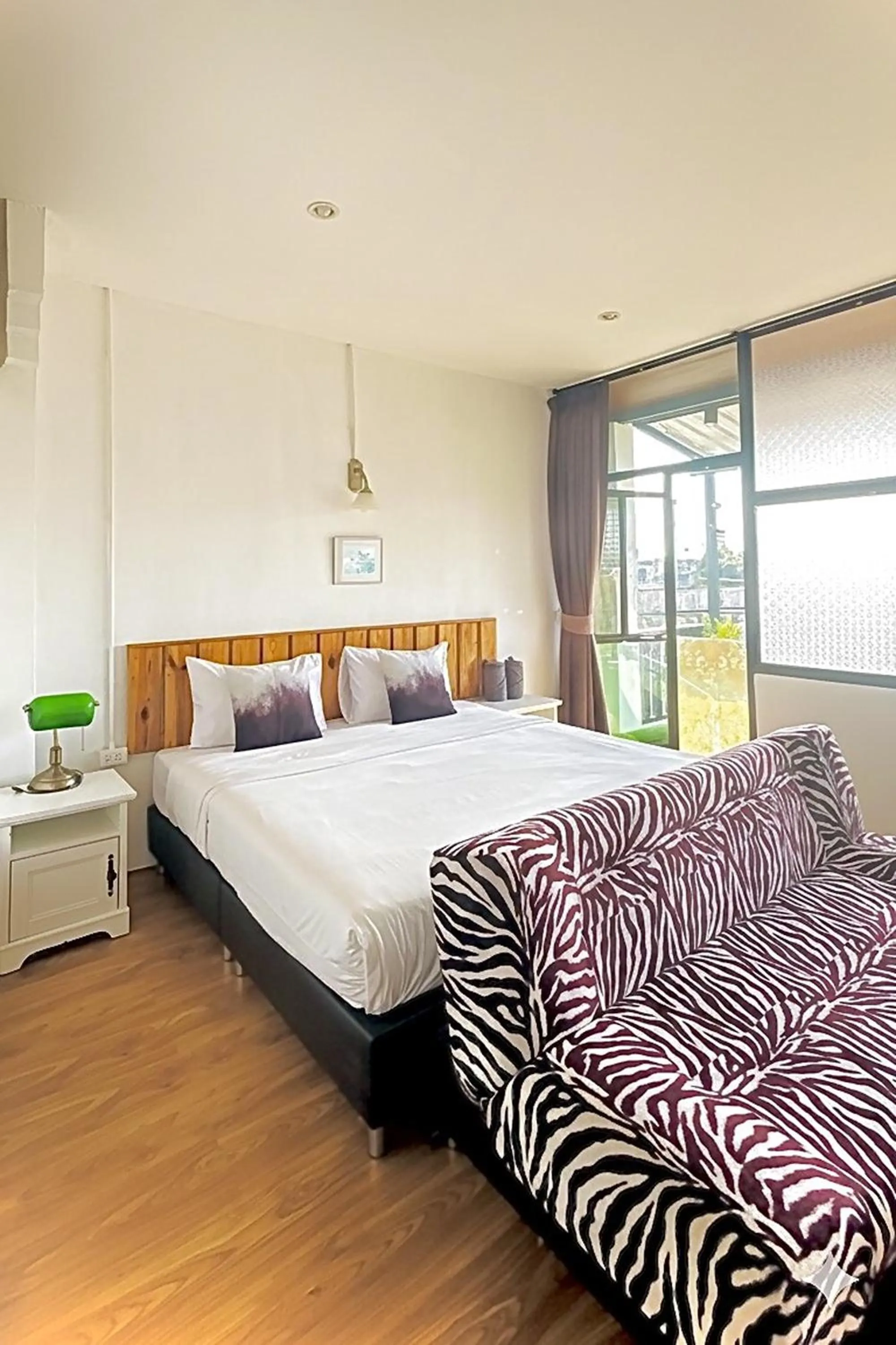 Bed in The Yak Cozy Chiang Mai