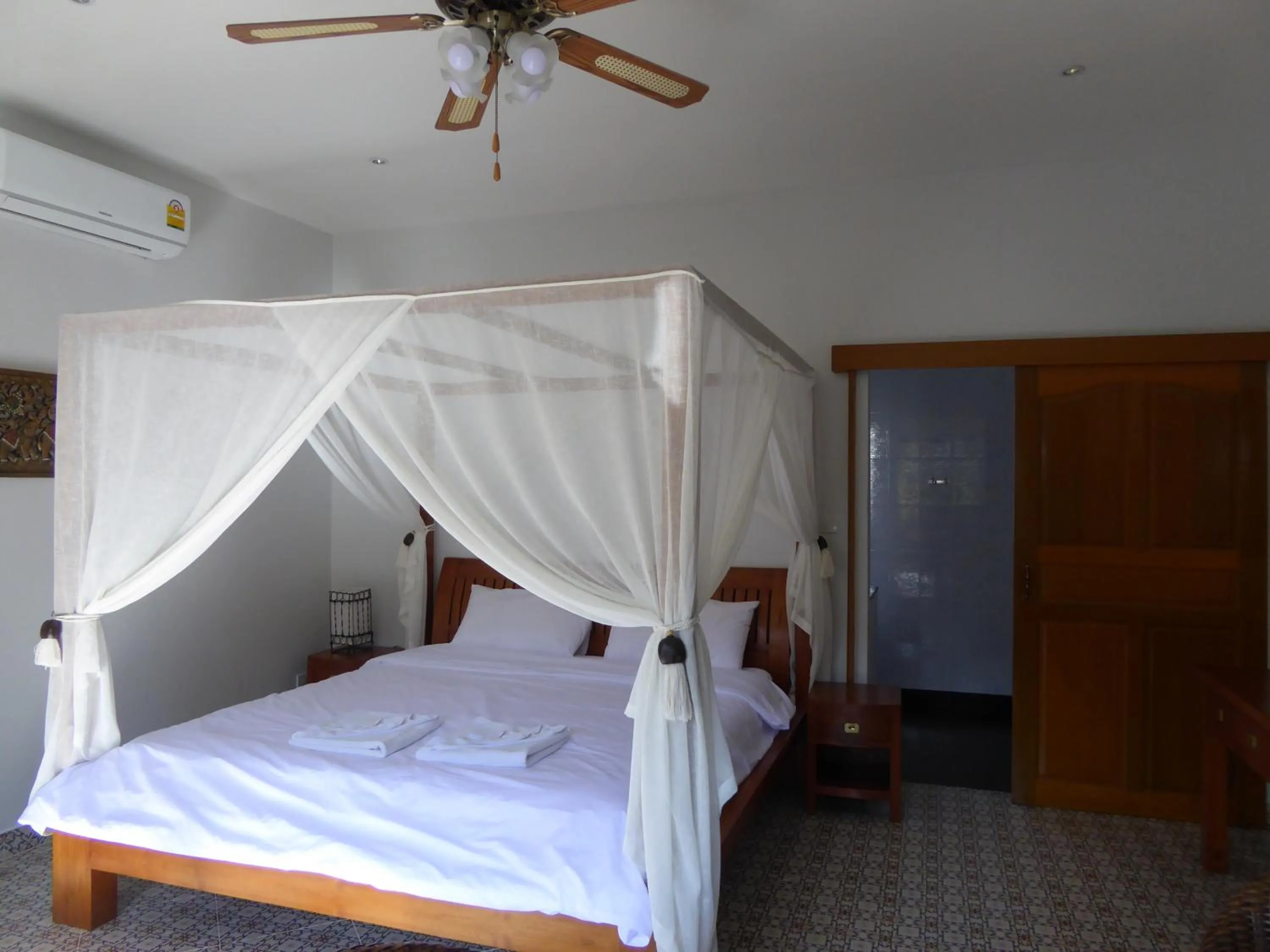 Bed in VIP Chain Resort Pool Villa