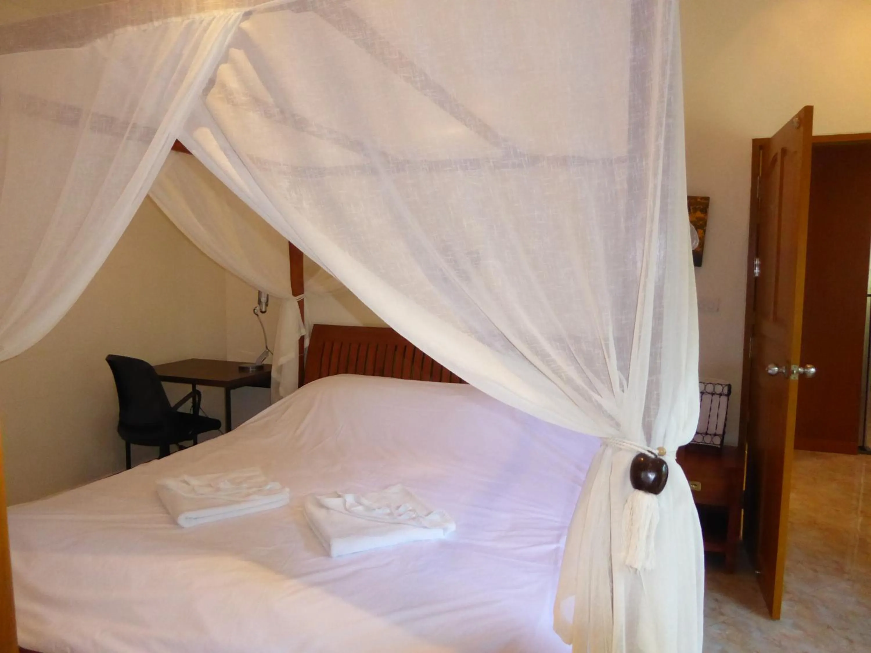 Bed in VIP Chain Resort Pool Villa