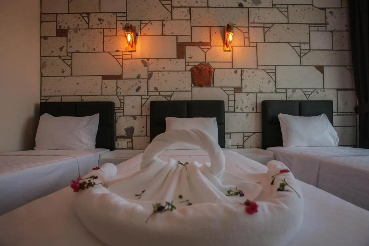 Bed in Lebedos Apart Hotel 1