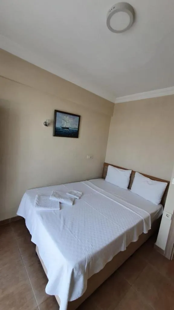 Bed in Lebedos Apart Hotel 1