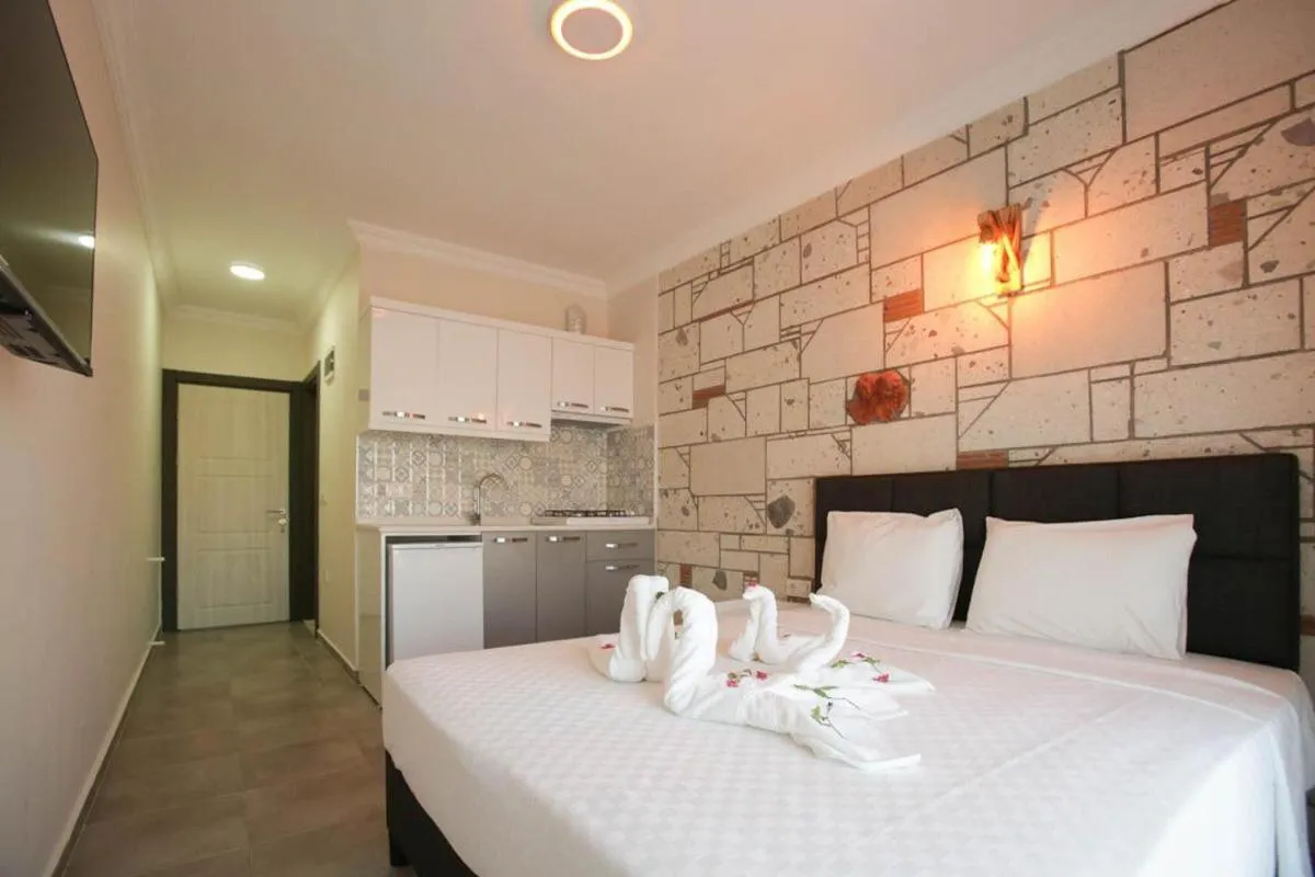 Bed in Lebedos Apart Hotel 1