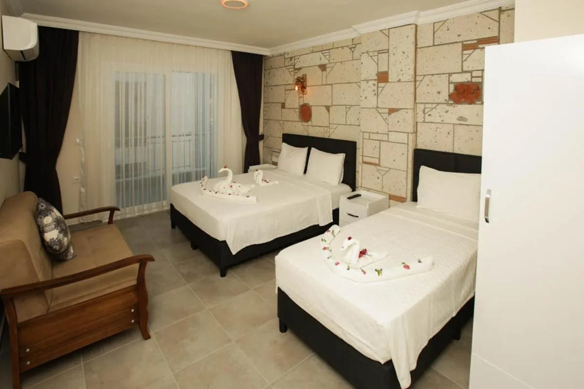 Bed in Lebedos Apart Hotel 1