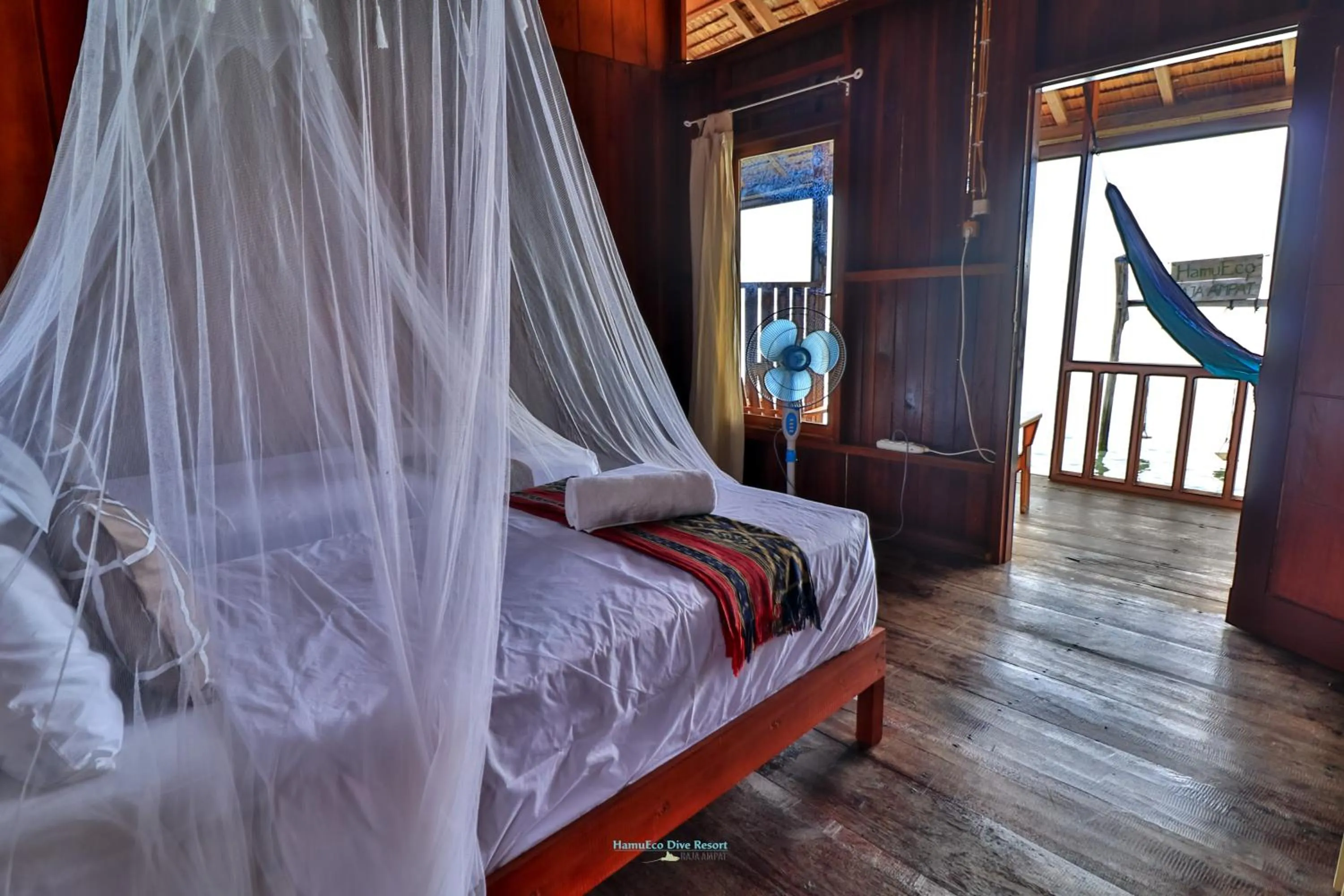 Bed in Hamueco Dive Resort Raja Ampat