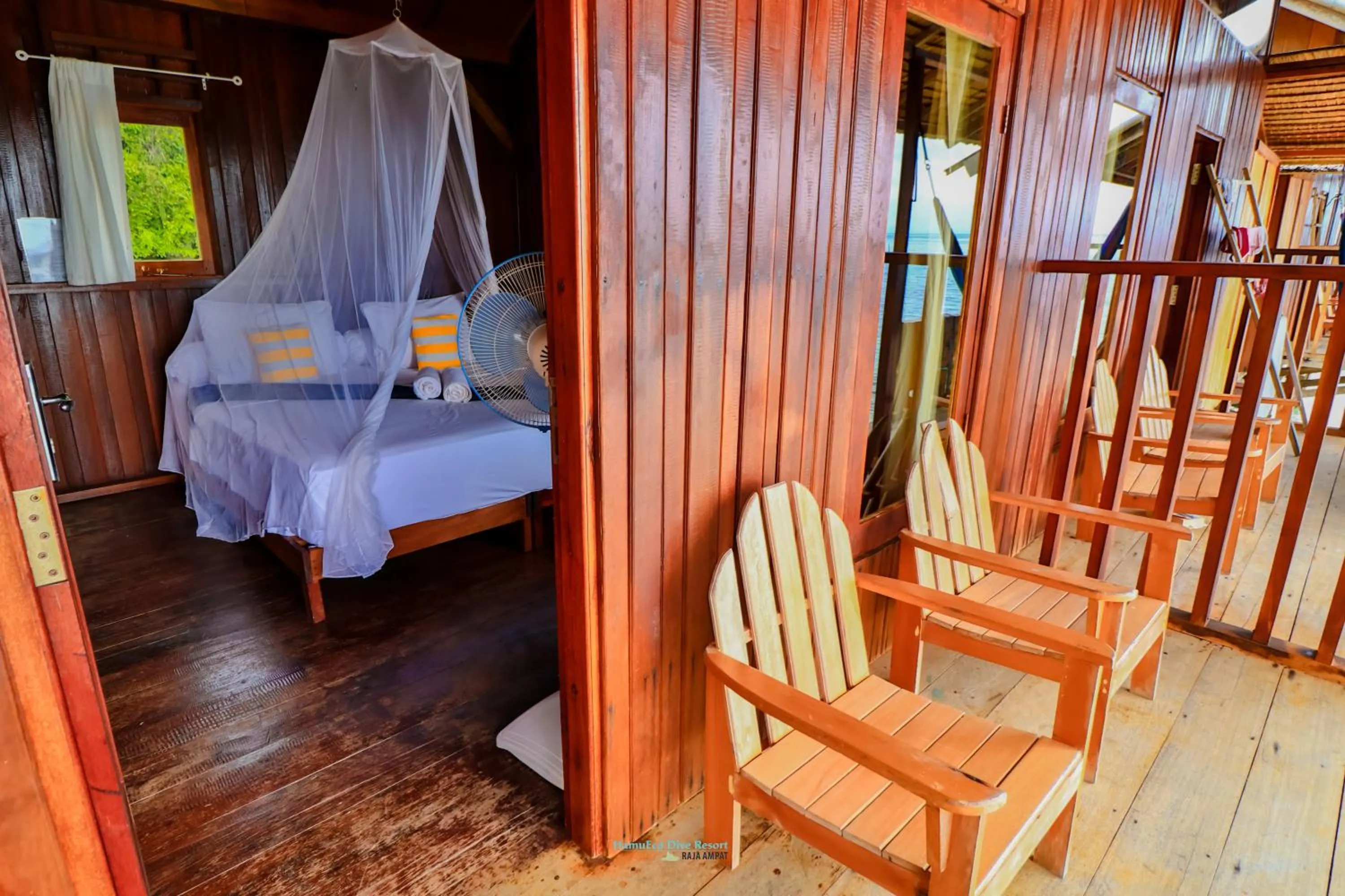 Bed in Hamueco Dive Resort Raja Ampat