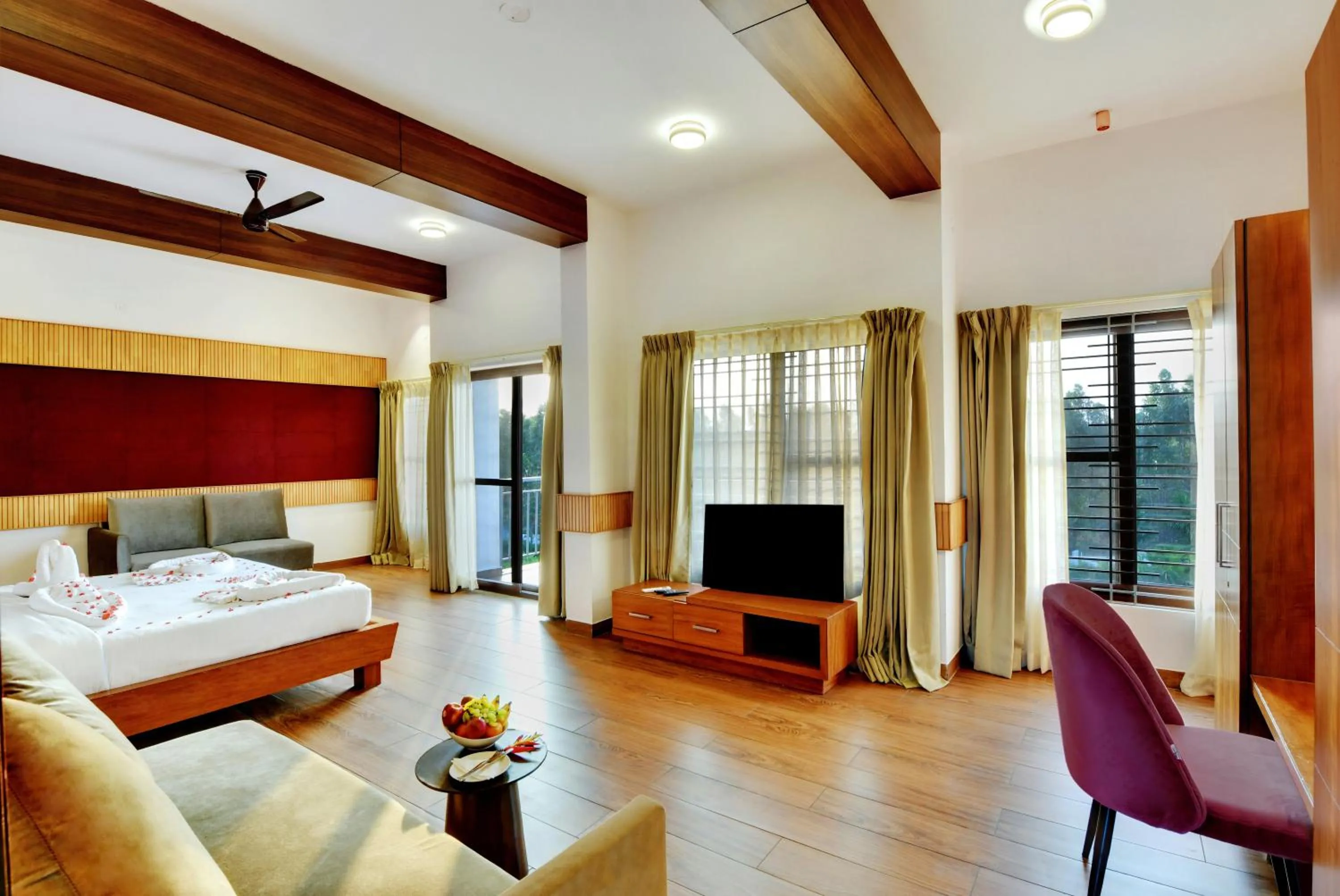 Seating area, Bed in Sportico Resort Bangalore