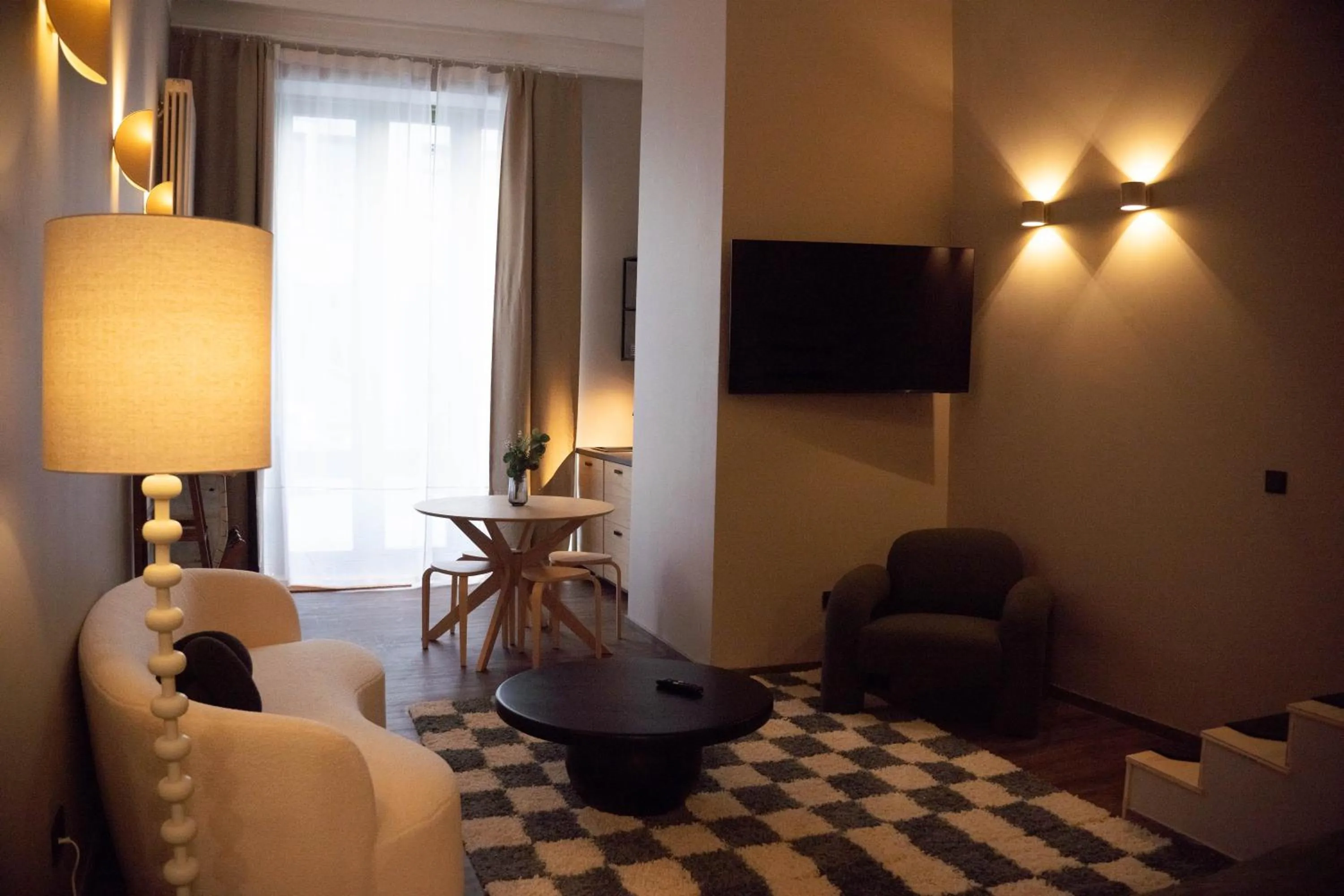 Photo of the whole room in The Charming by Curt Suites