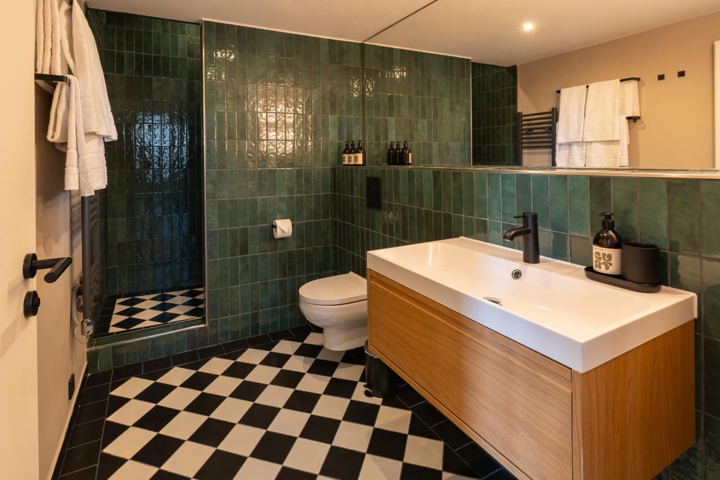 Bathroom in The Charming by Curt Suites