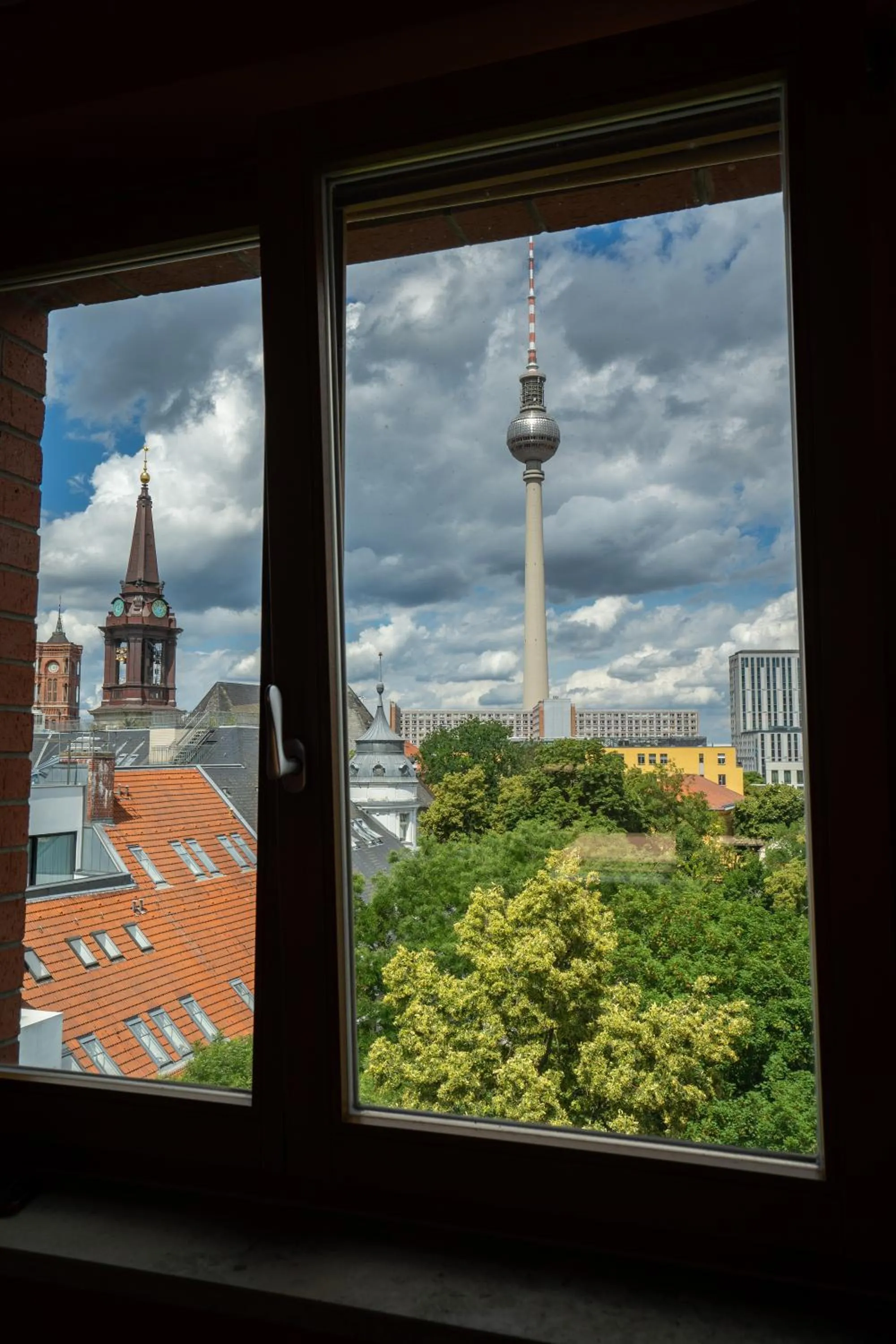 Living room in The Charming by Curt Suites