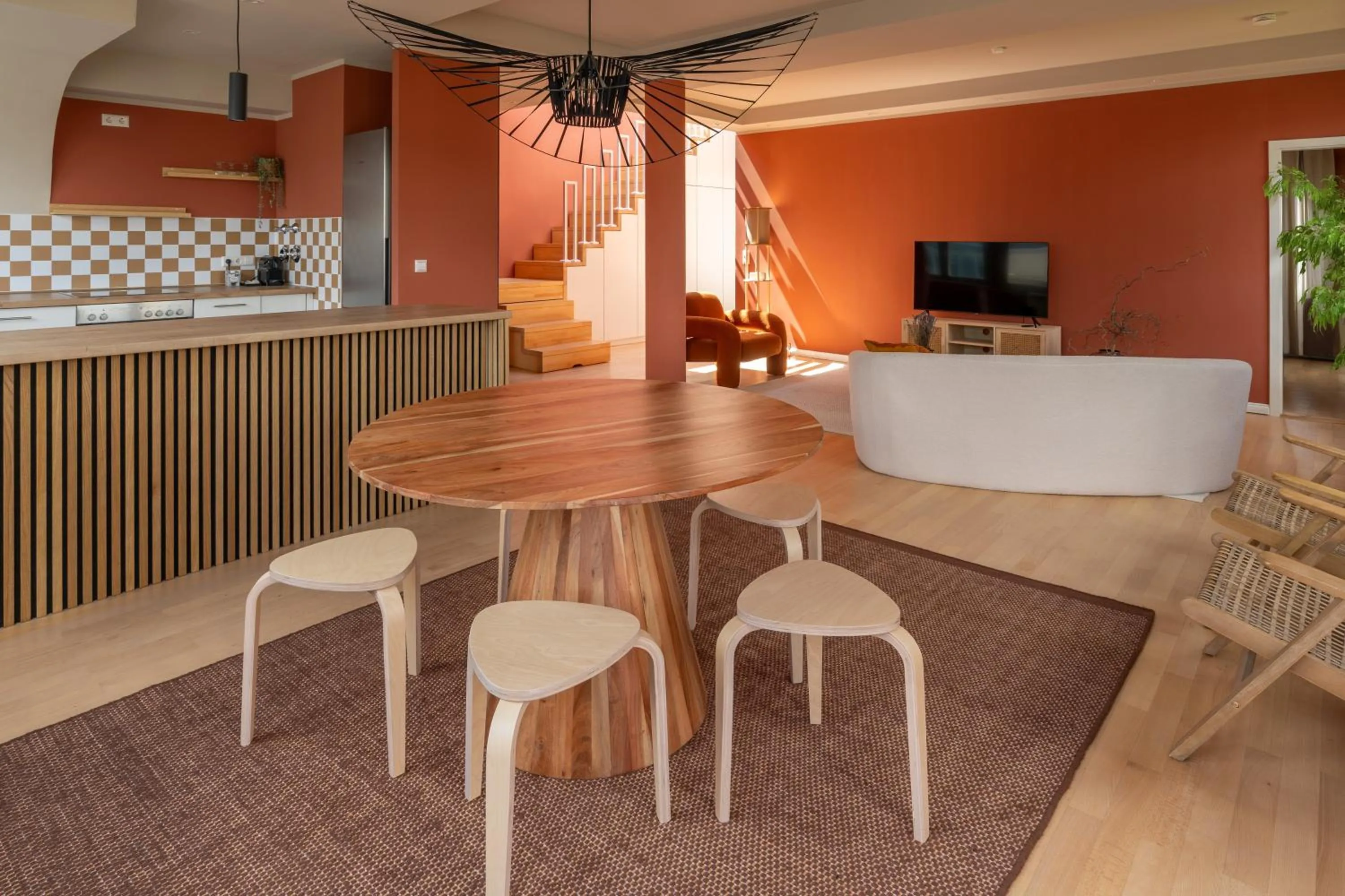 Living room in The Charming by Curt Suites