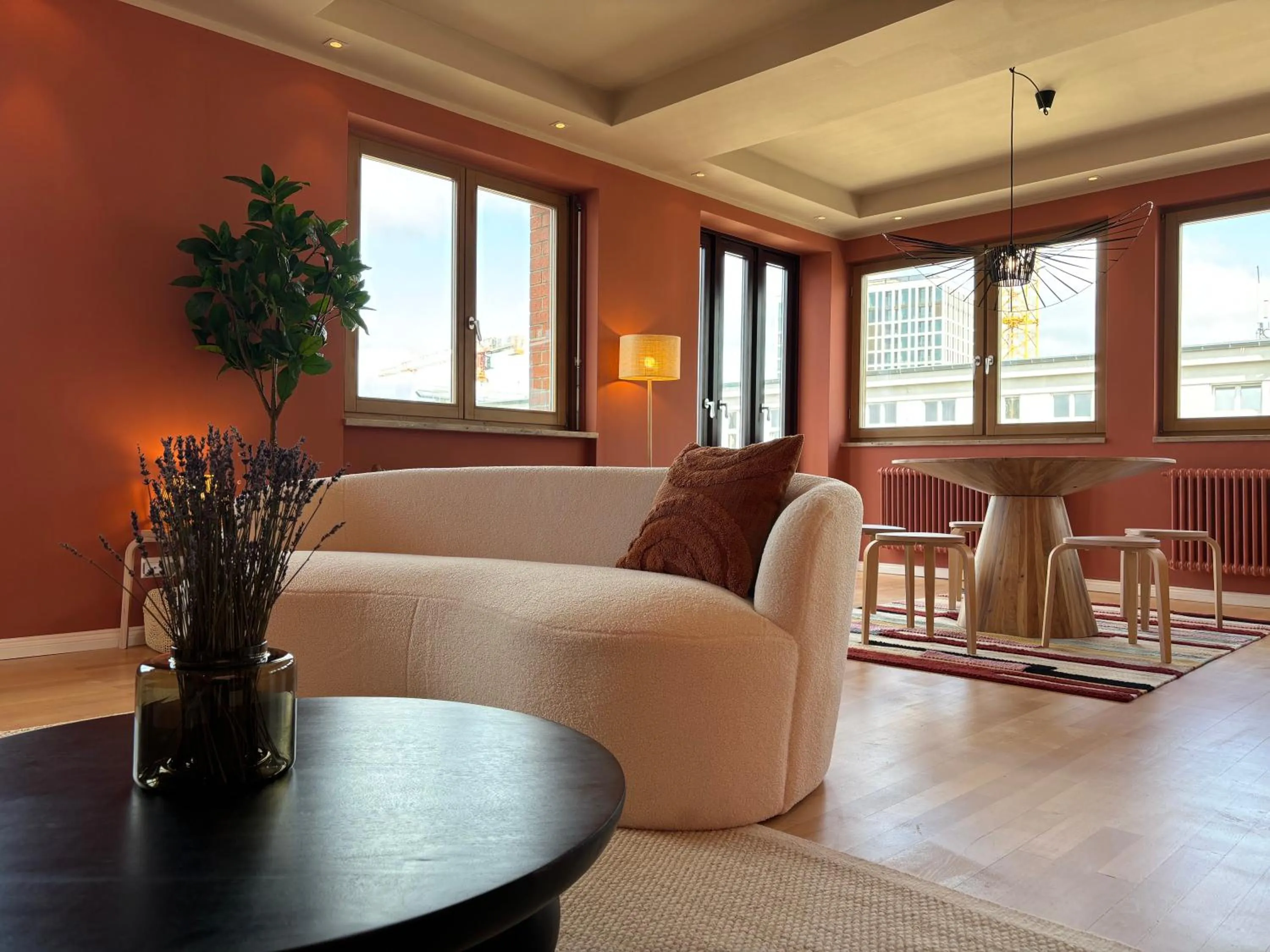 Living room in The Charming by Curt Suites