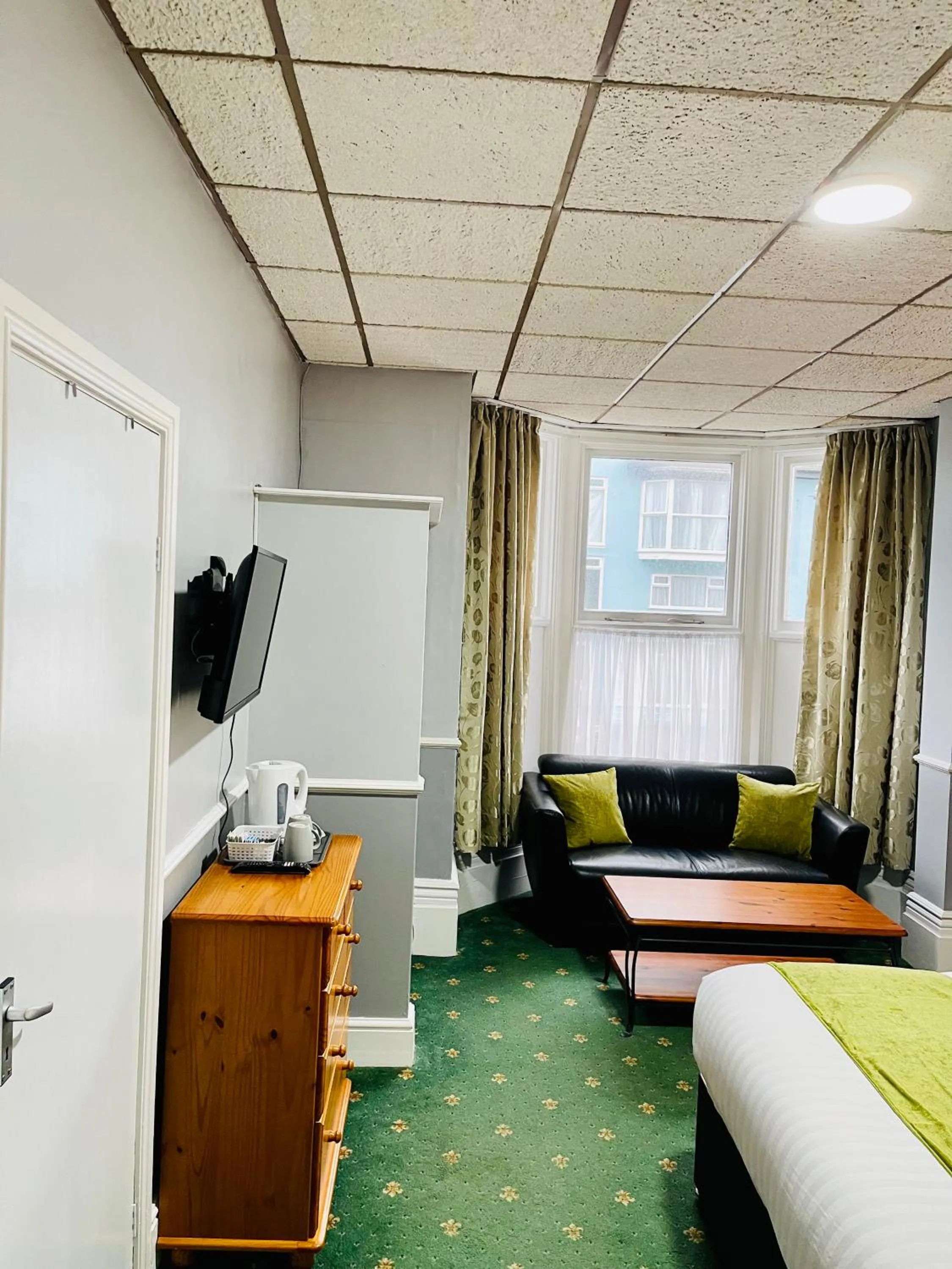 Seating area in Palm Court B&B