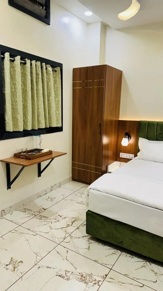 Bed in Hotel Ratnam Palace Maheshwar