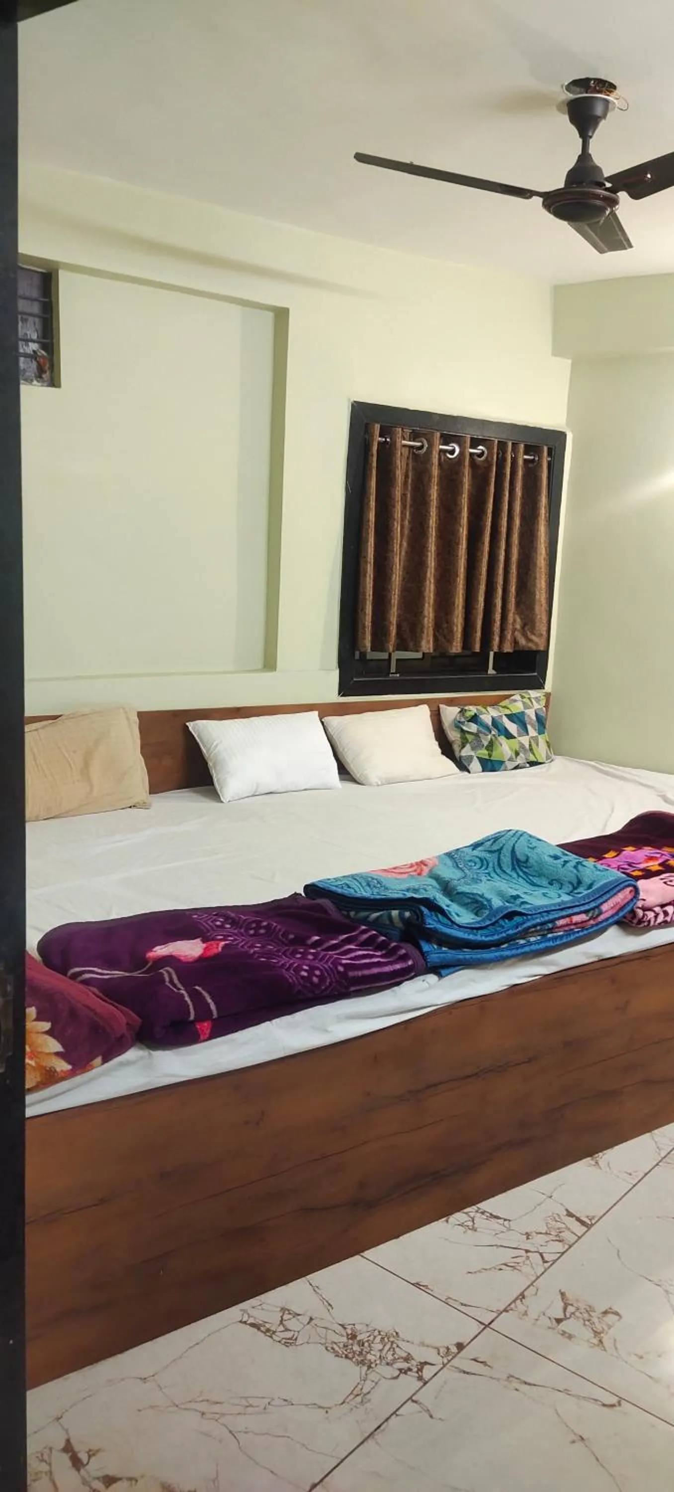 Bed in Hotel Ratnam Palace Maheshwar