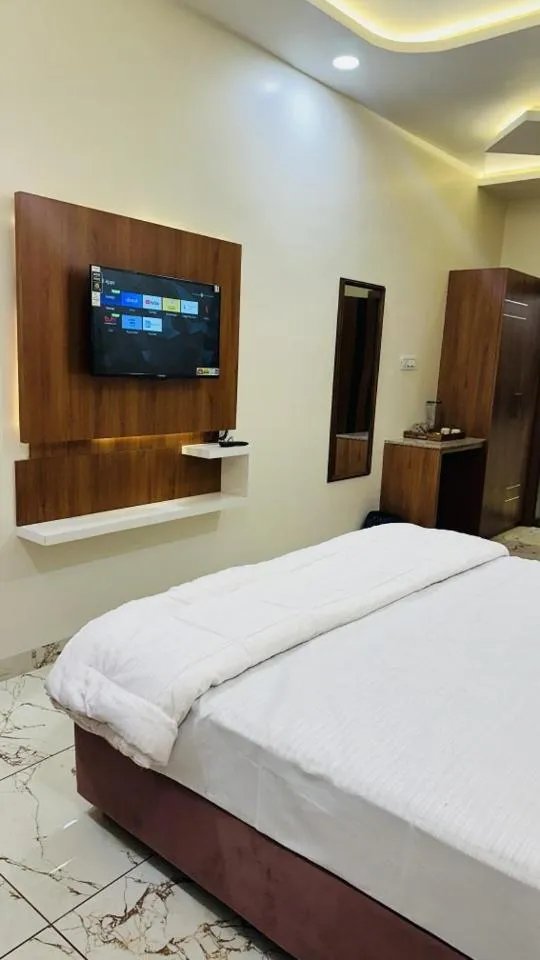 Bed in Hotel Ratnam Palace Maheshwar