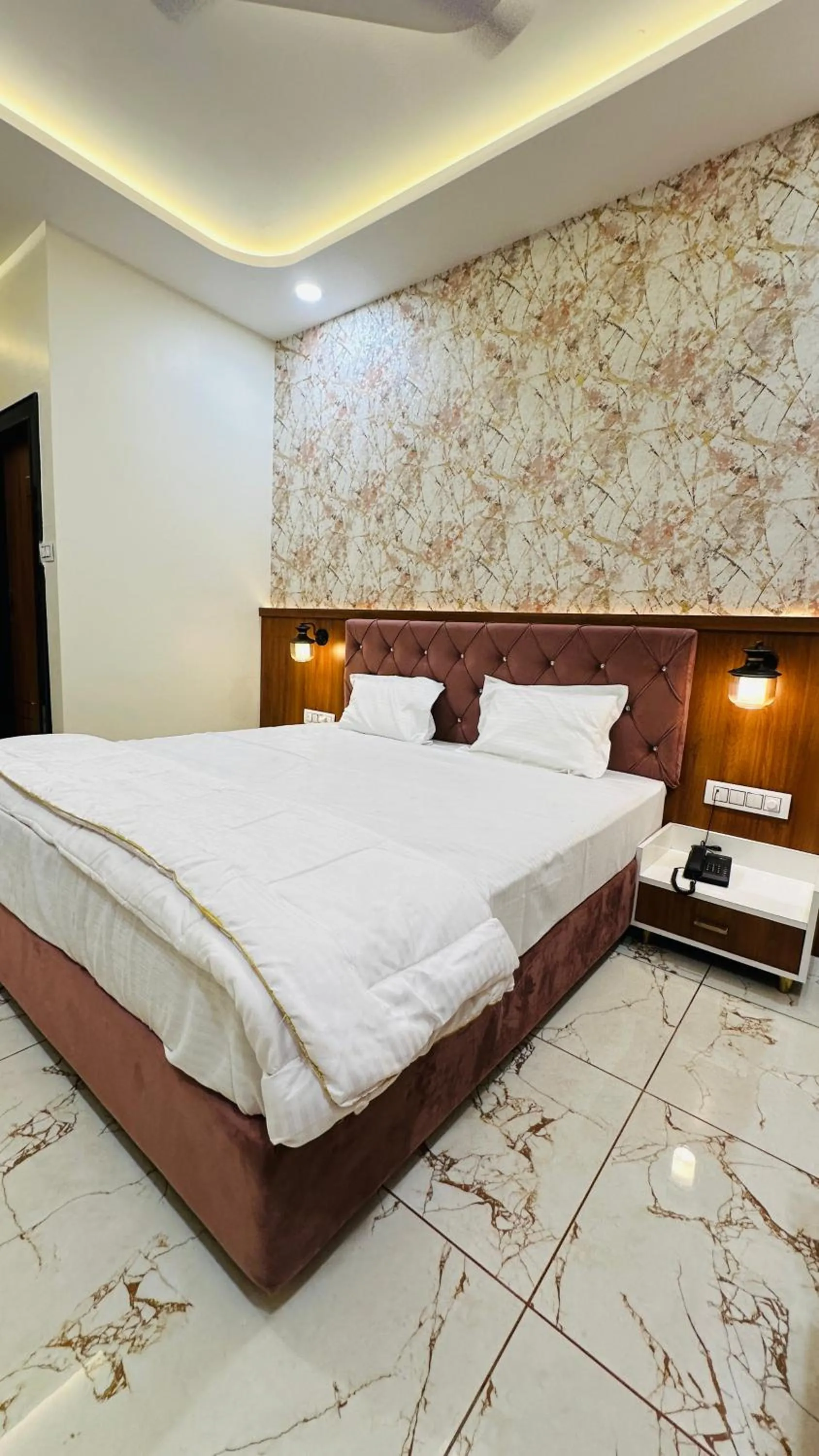 Bed in Hotel Ratnam Palace Maheshwar