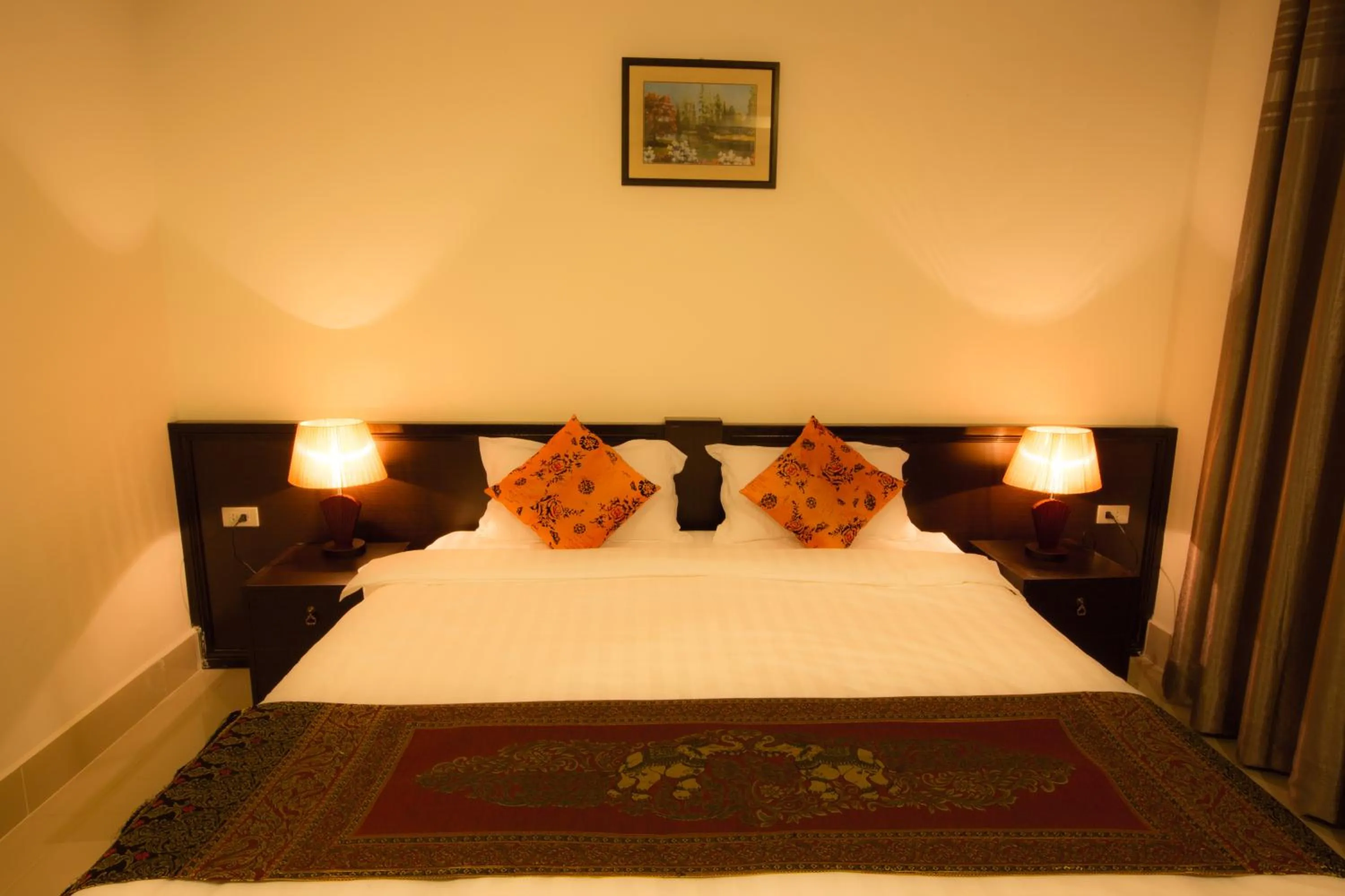 Bed in Douangchan Plaza Hotel