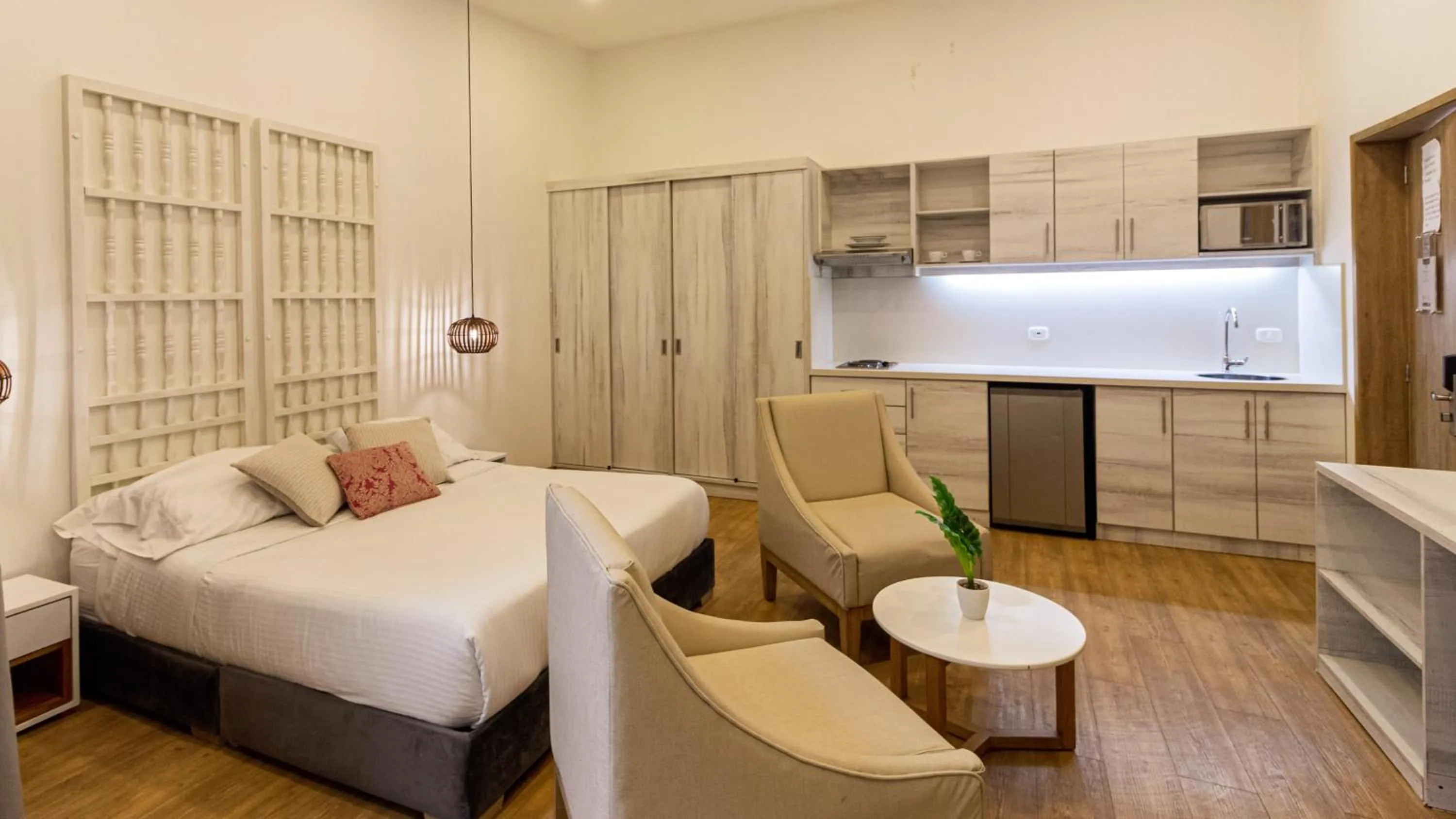 Photo of the whole room, Bed in Cartagena Suites de Manga