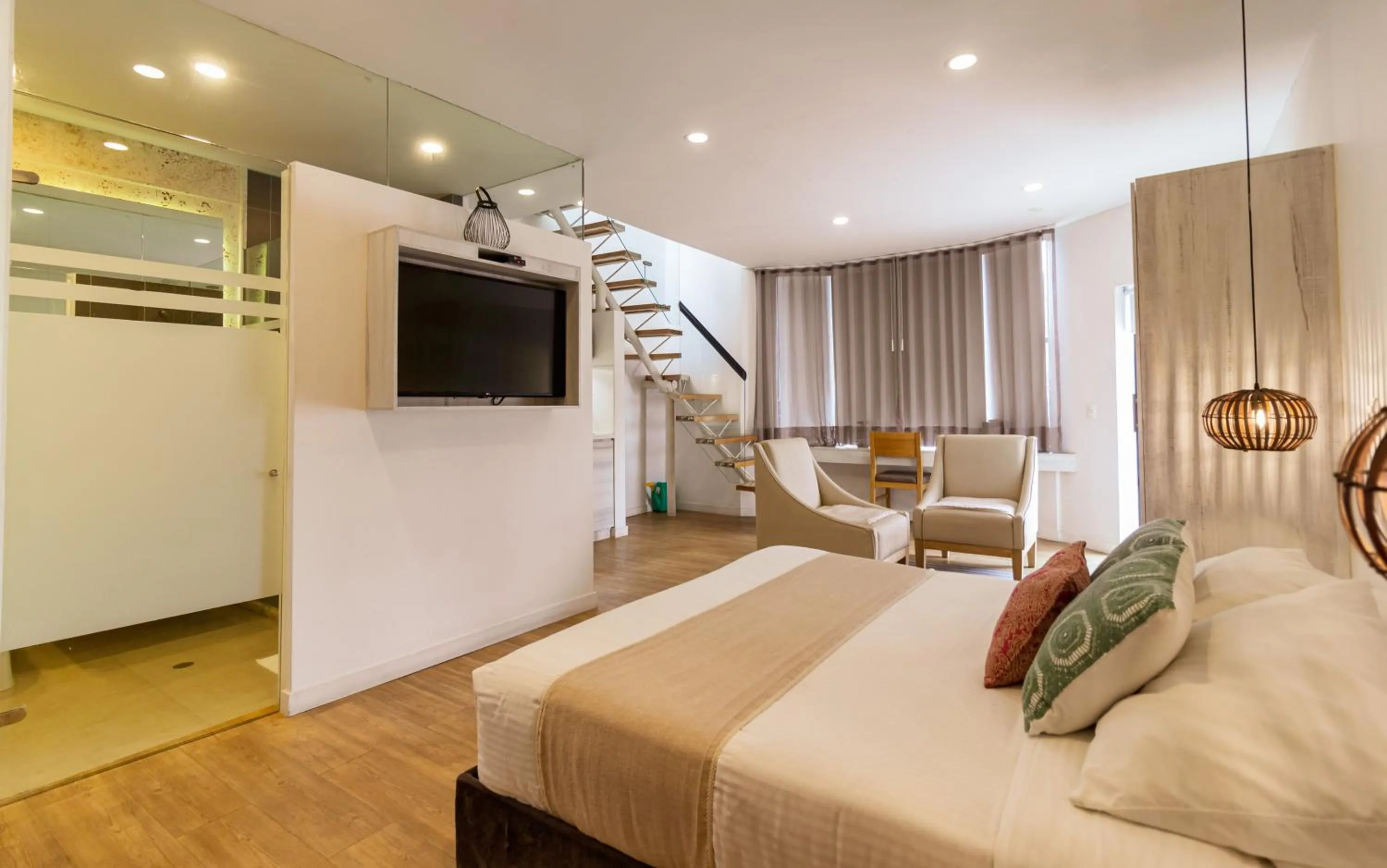 Photo of the whole room, Bed in Cartagena Suites de Manga