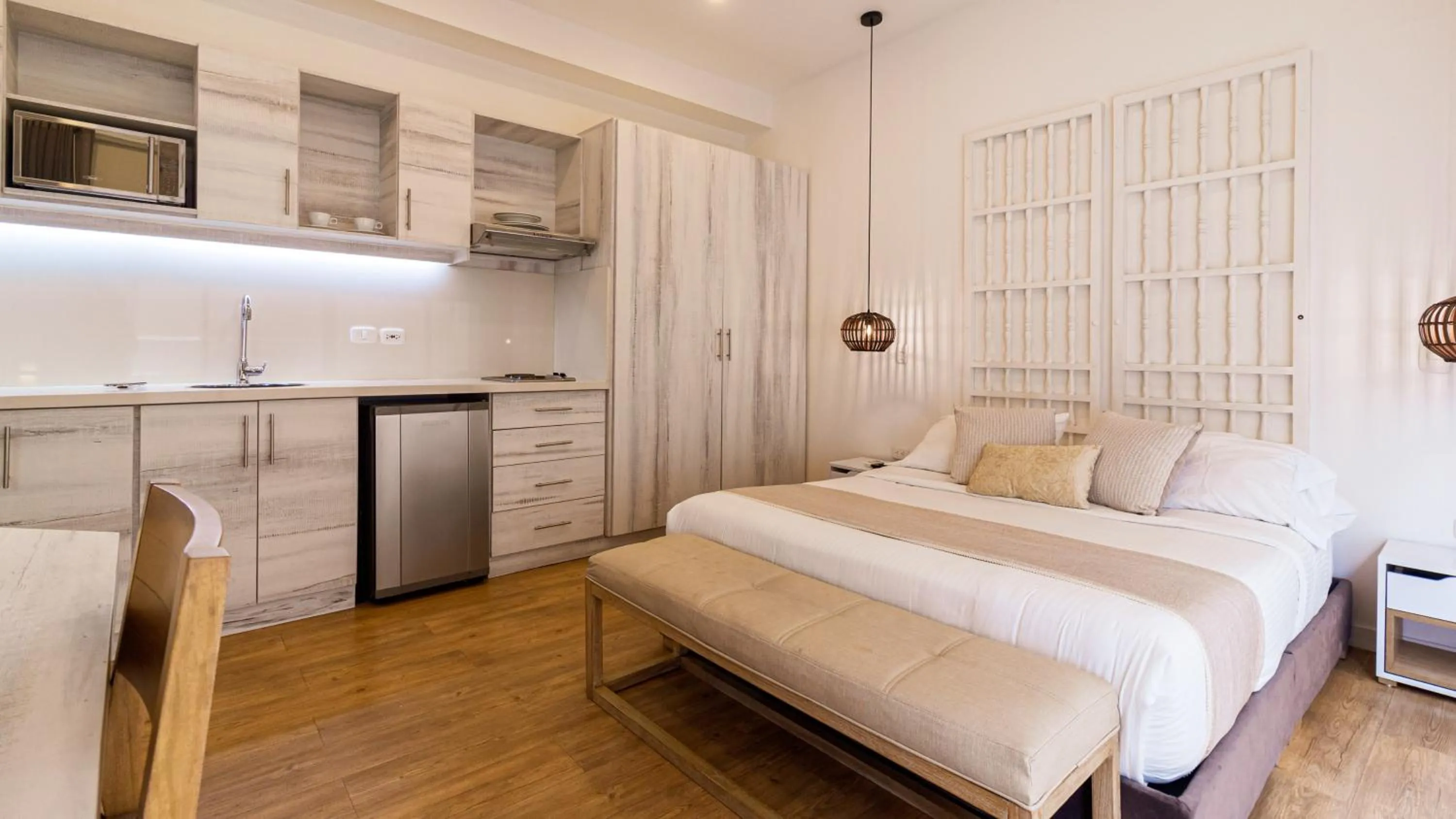 Photo of the whole room, Bed in Cartagena Suites de Manga