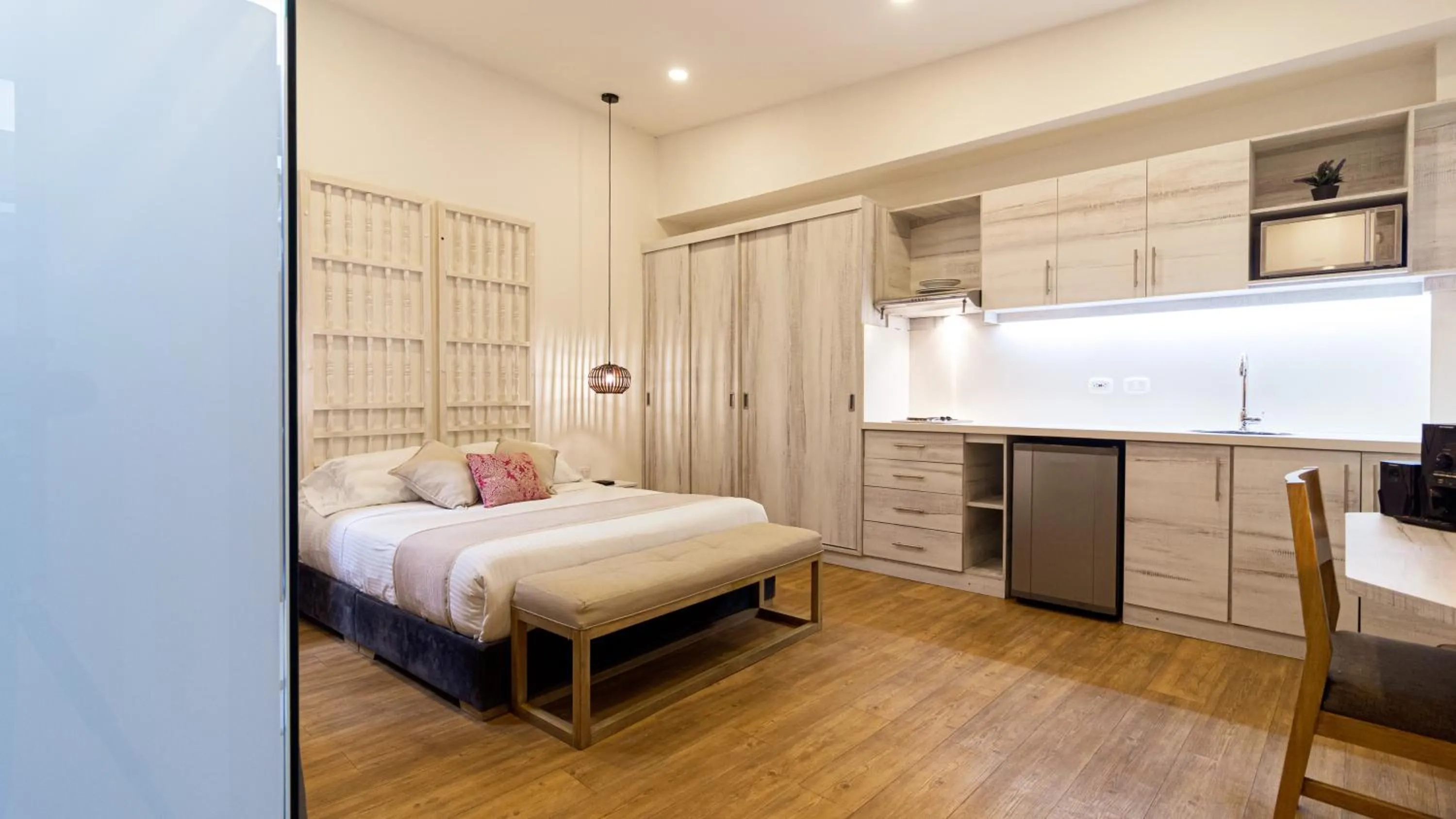 Photo of the whole room, Bed in Cartagena Suites de Manga