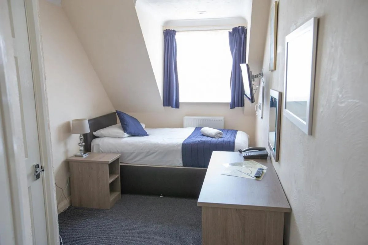 Bedroom, Bed in Corner House Hotel Gatwick with bookable Holiday parking