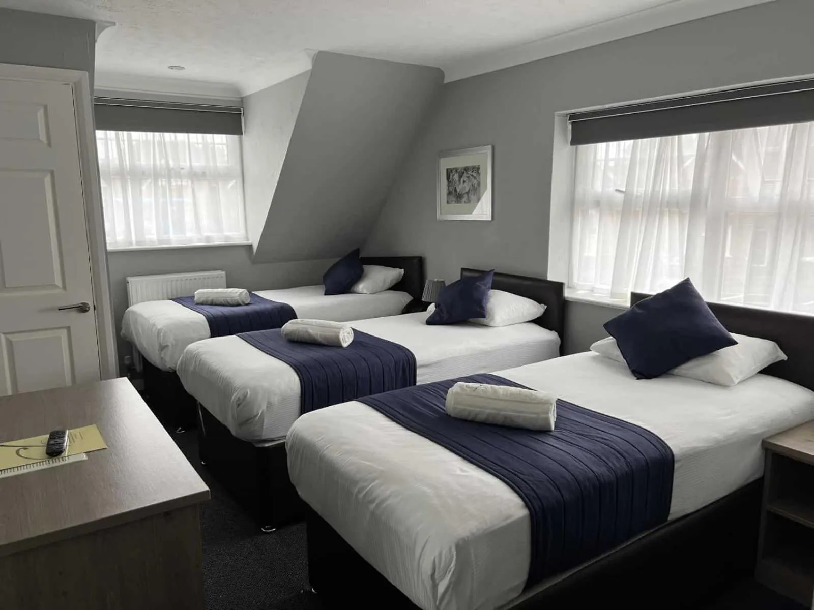 Bed in Corner House Hotel Gatwick with bookable Holiday parking