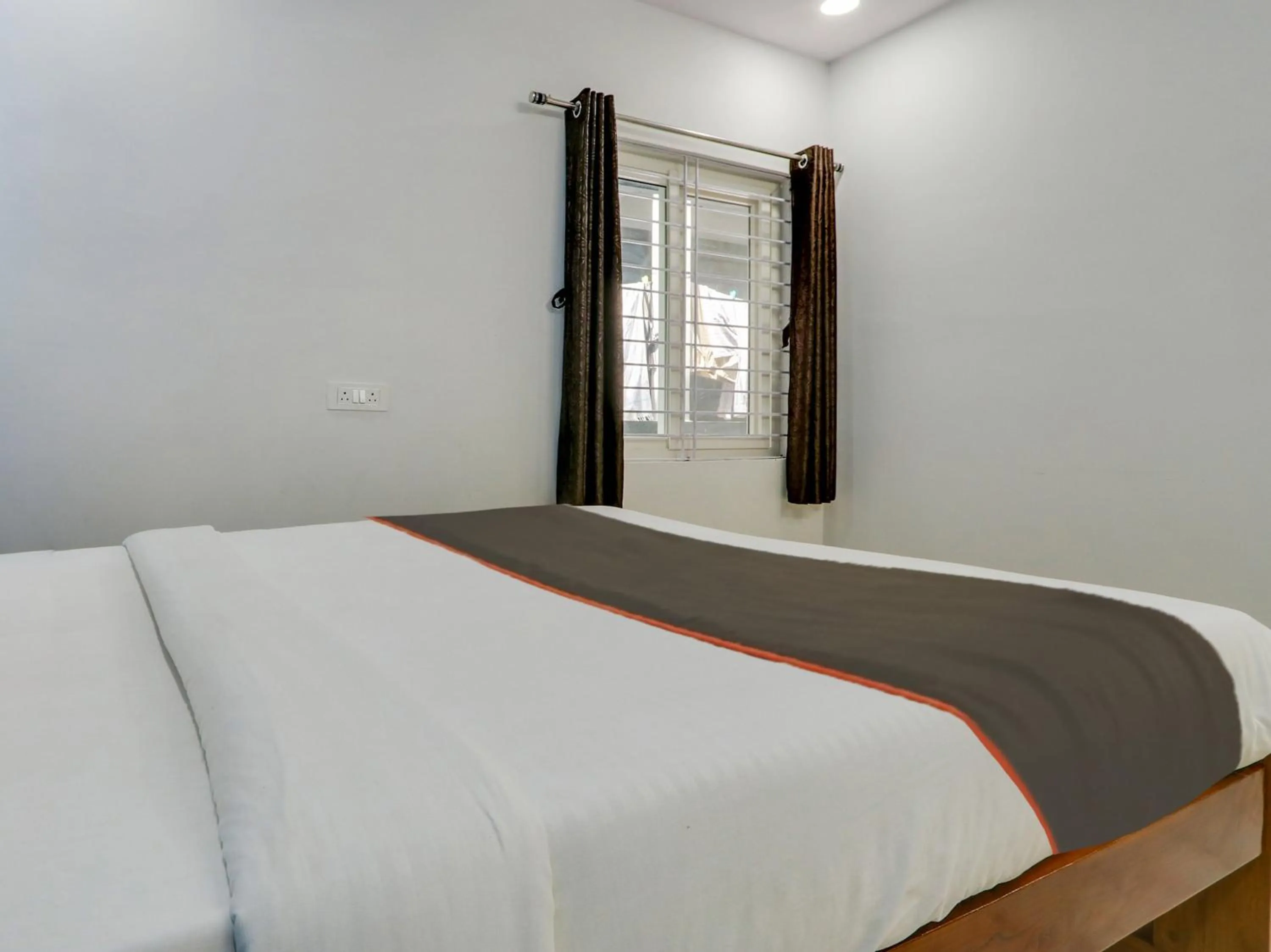 Bedroom in Hotel O SR Grand