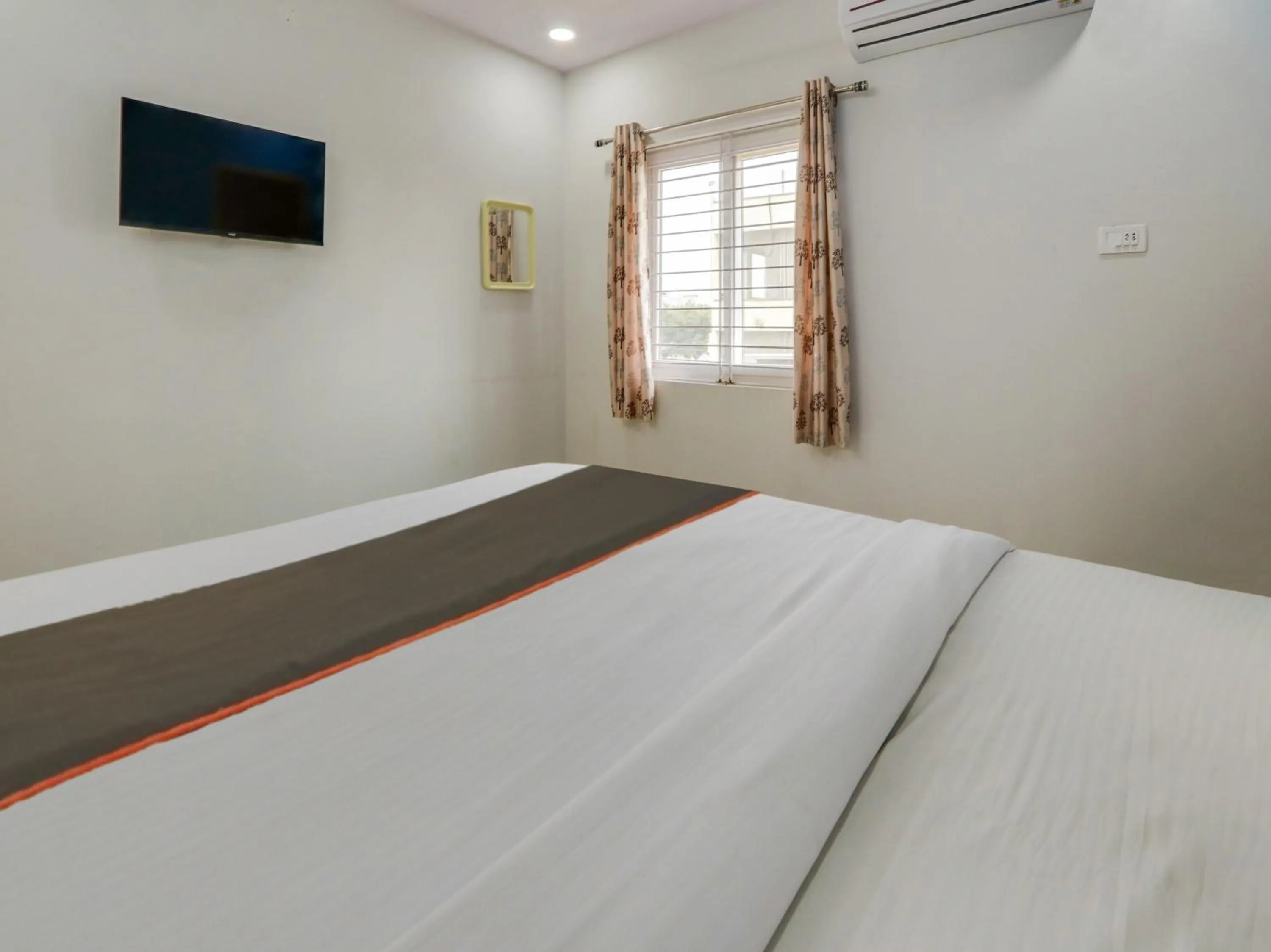 Bedroom in Hotel O SR Grand