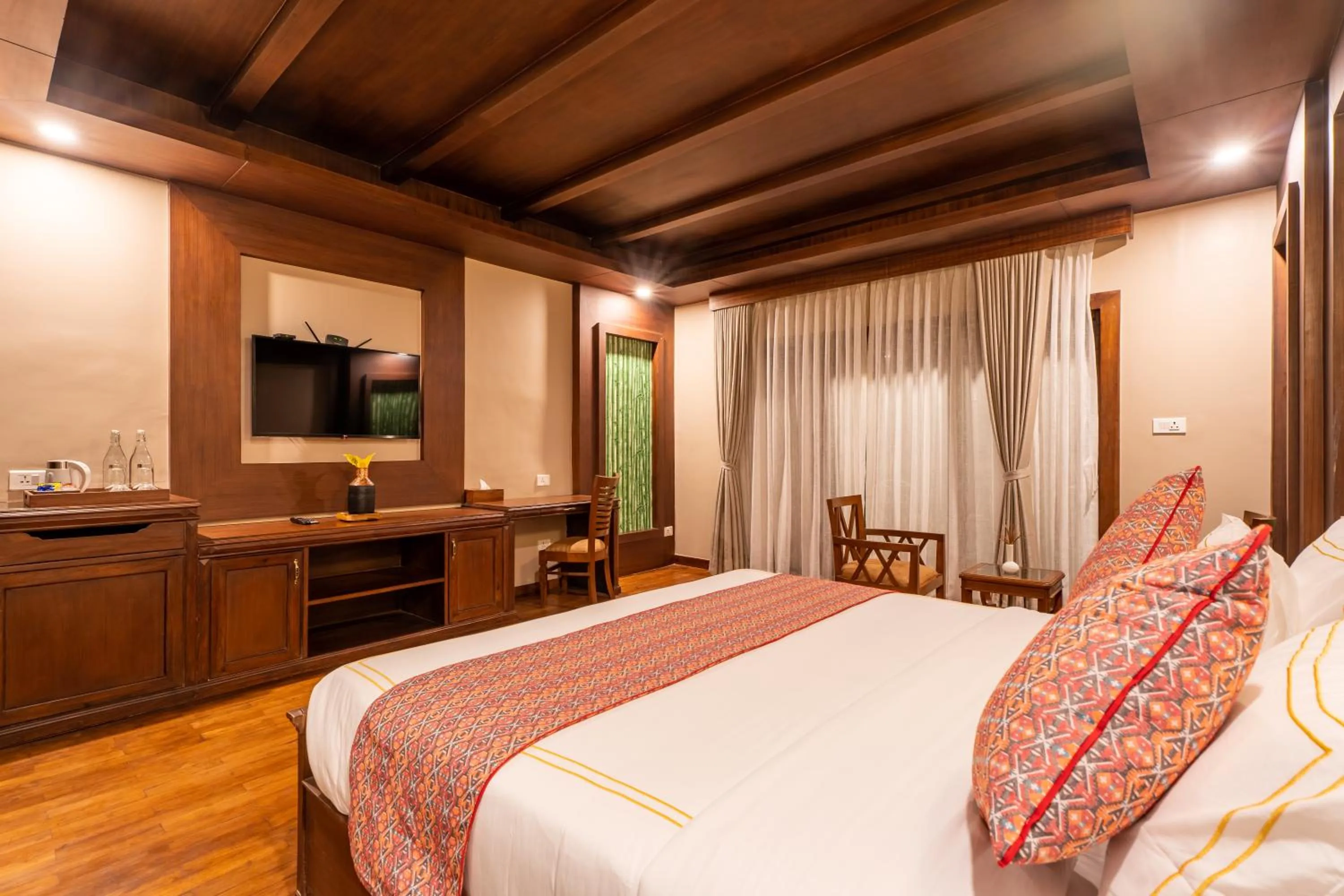 Bed in River Bank Jungle Resort, Chitwan