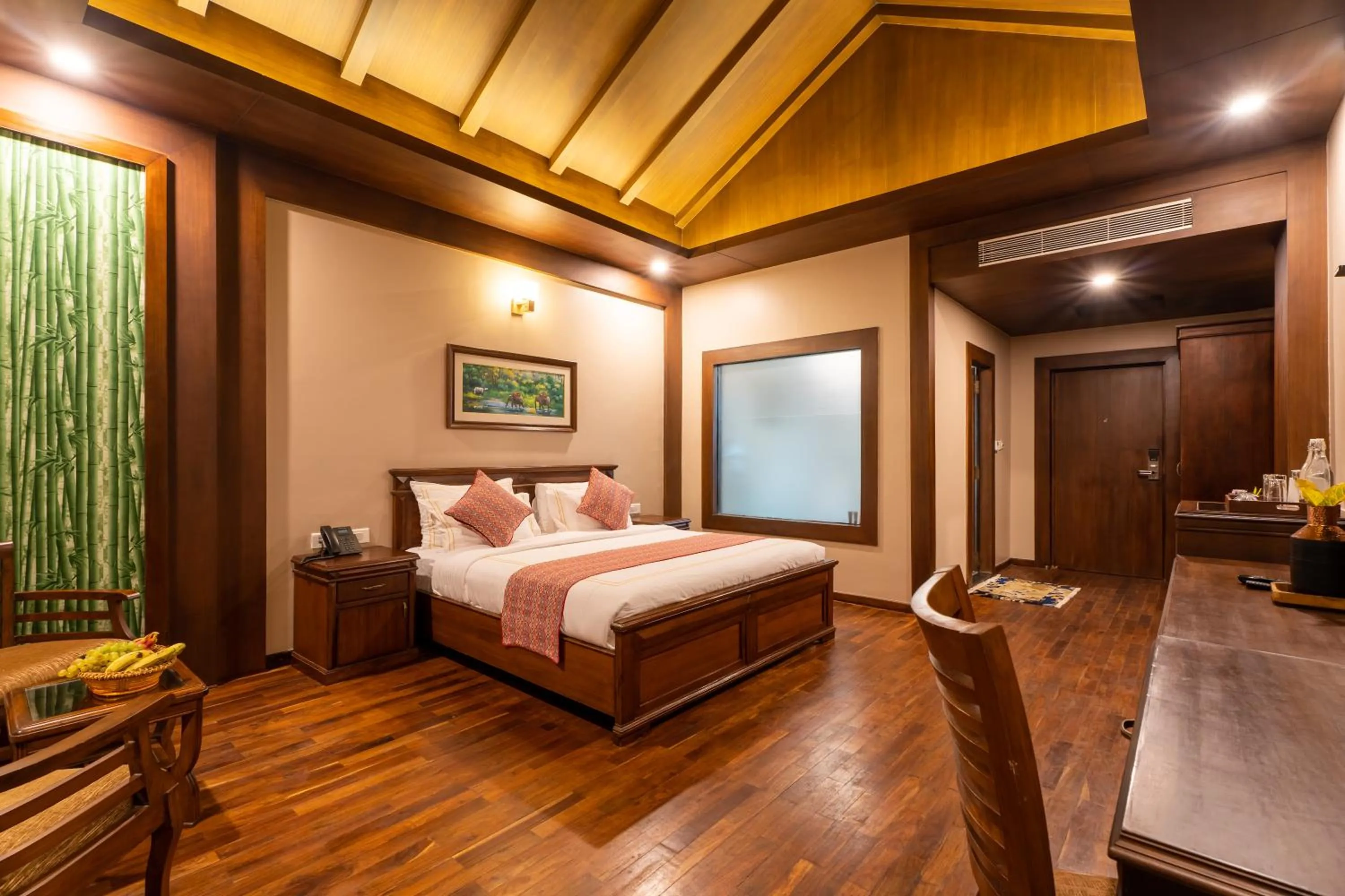 Bed in River Bank Jungle Resort, Chitwan