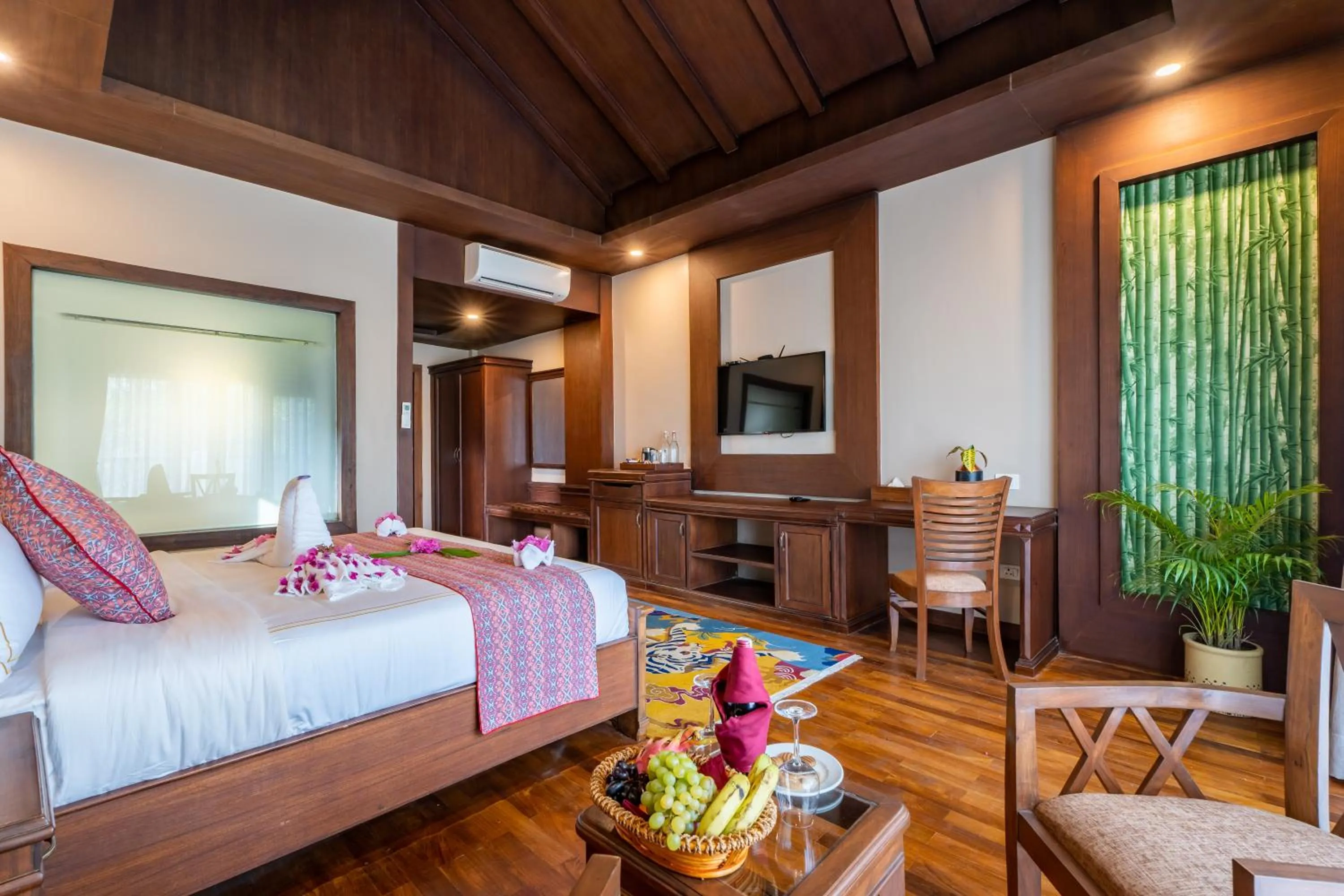 Bed in River Bank Jungle Resort, Chitwan