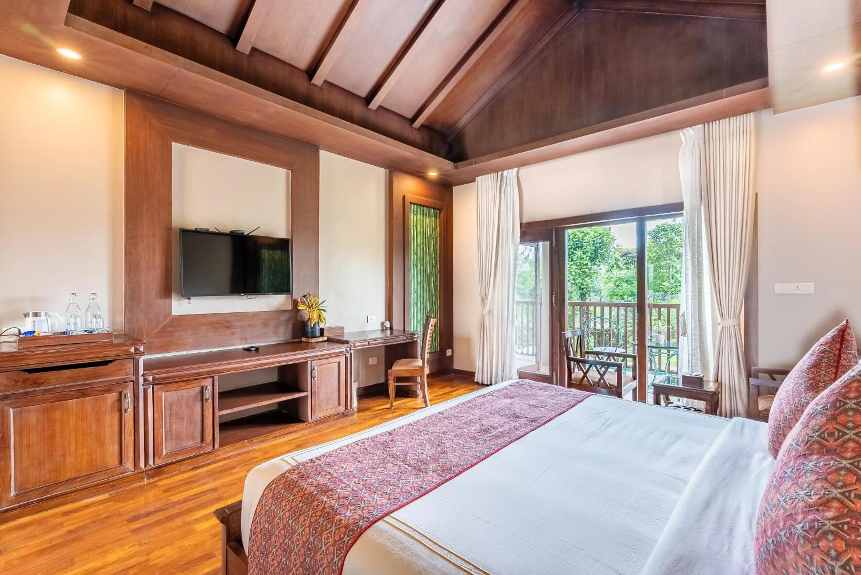 Bed in River Bank Jungle Resort, Chitwan