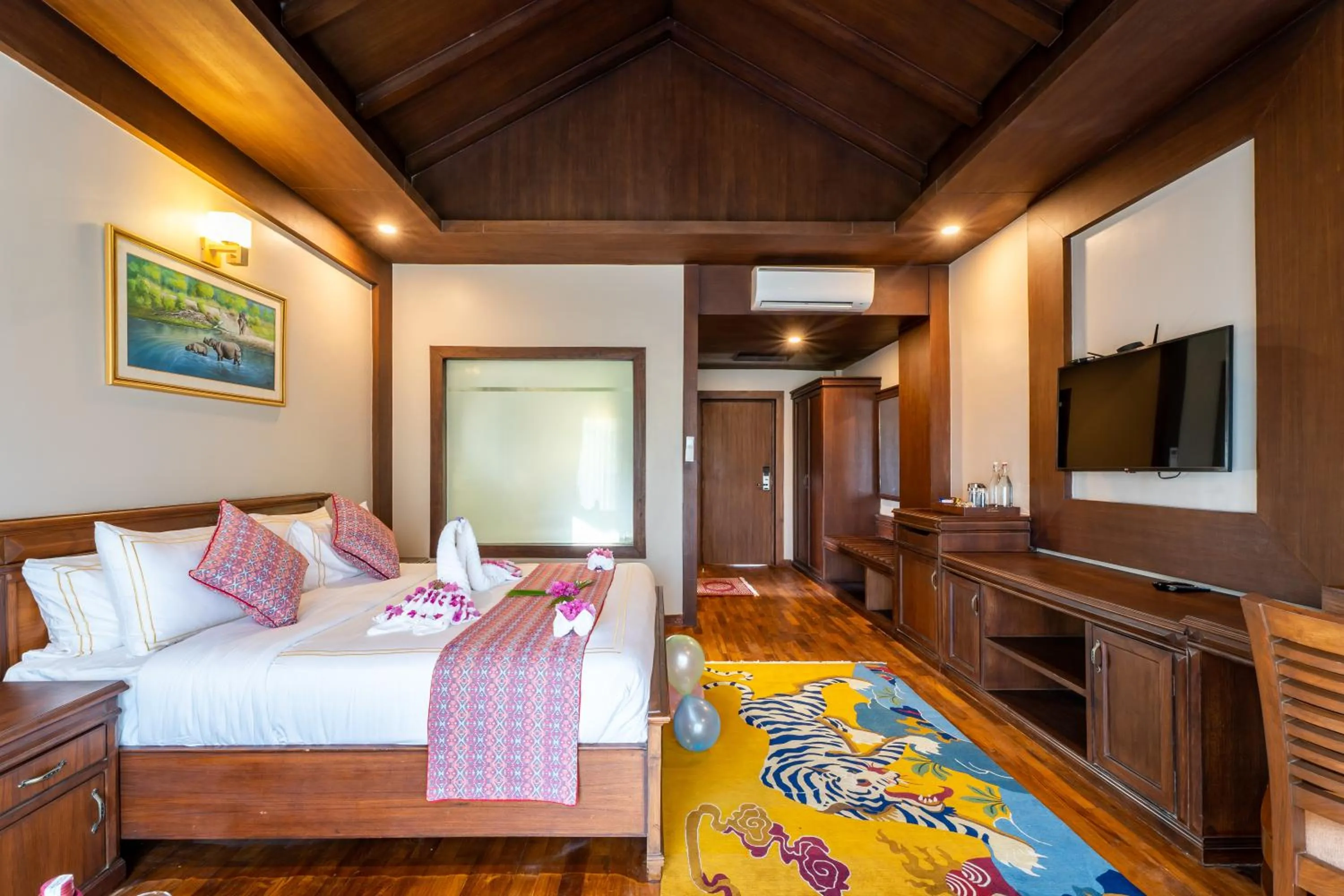 TV and multimedia, Bed in River Bank Jungle Resort, Chitwan