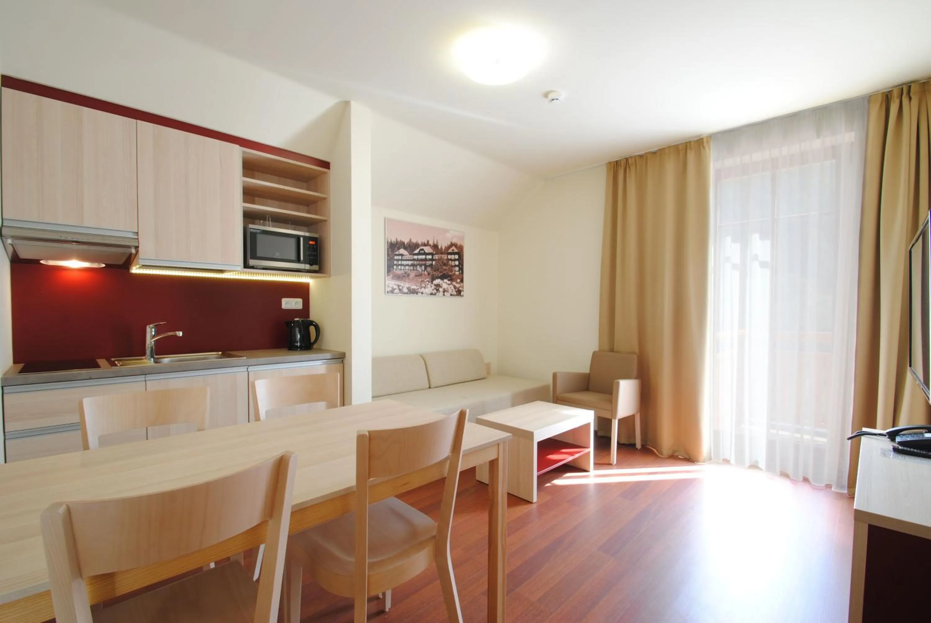 Kitchen or kitchenette in Peras Wellness Hotel