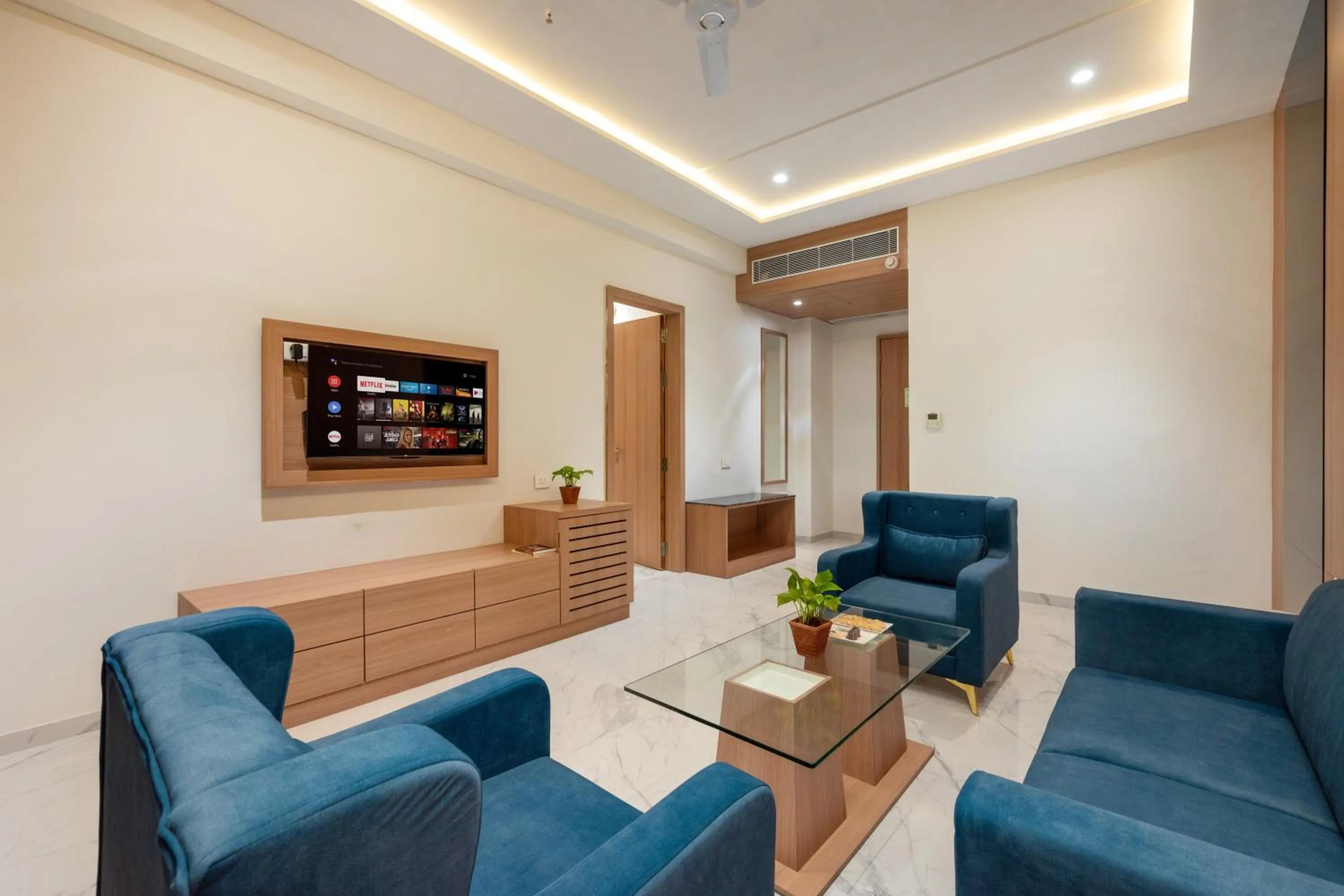 Communal lounge/ TV room in The Orchid Jamnagar