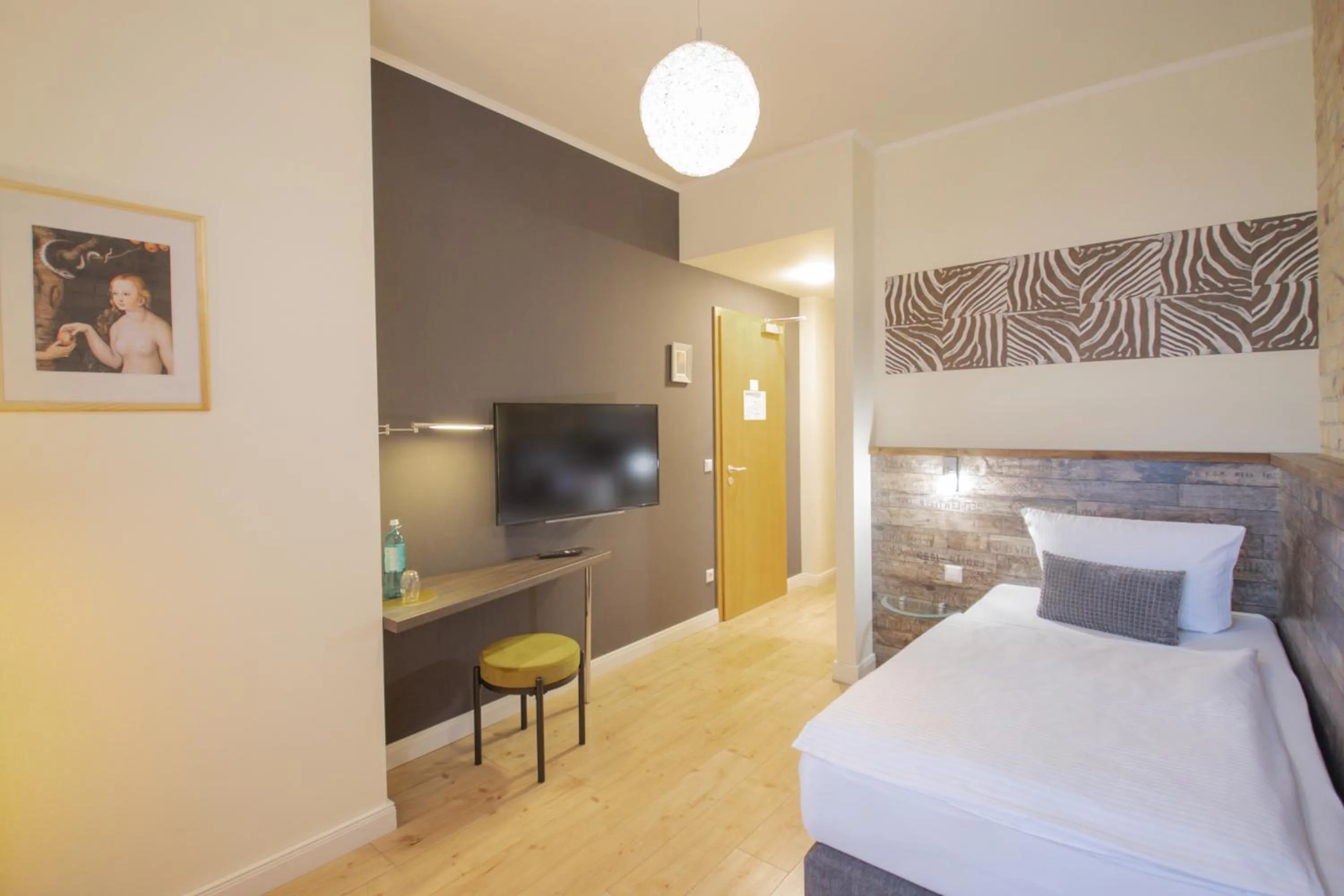 Photo of the whole room, Bed in Boutique Hotel Schwarzer Baer