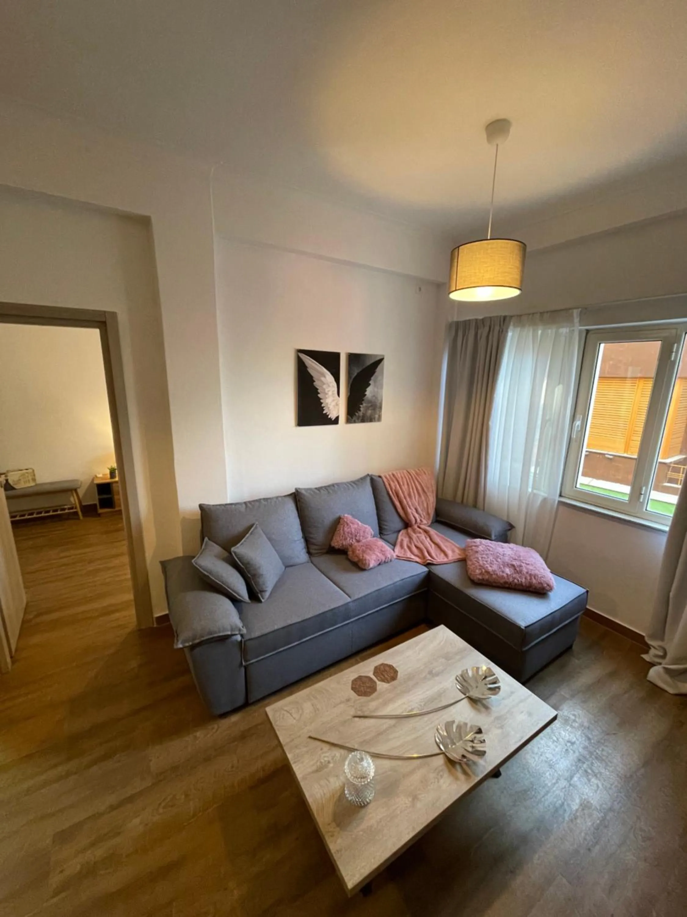 Living room, Bed in Compass Lofts Athens