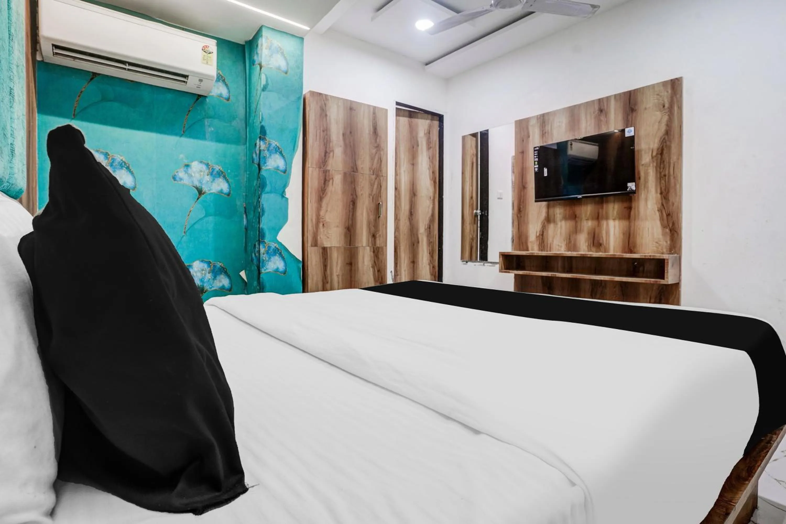 Bedroom in Super Collection O Maninagar Near Railway Station formerly A1 Residency