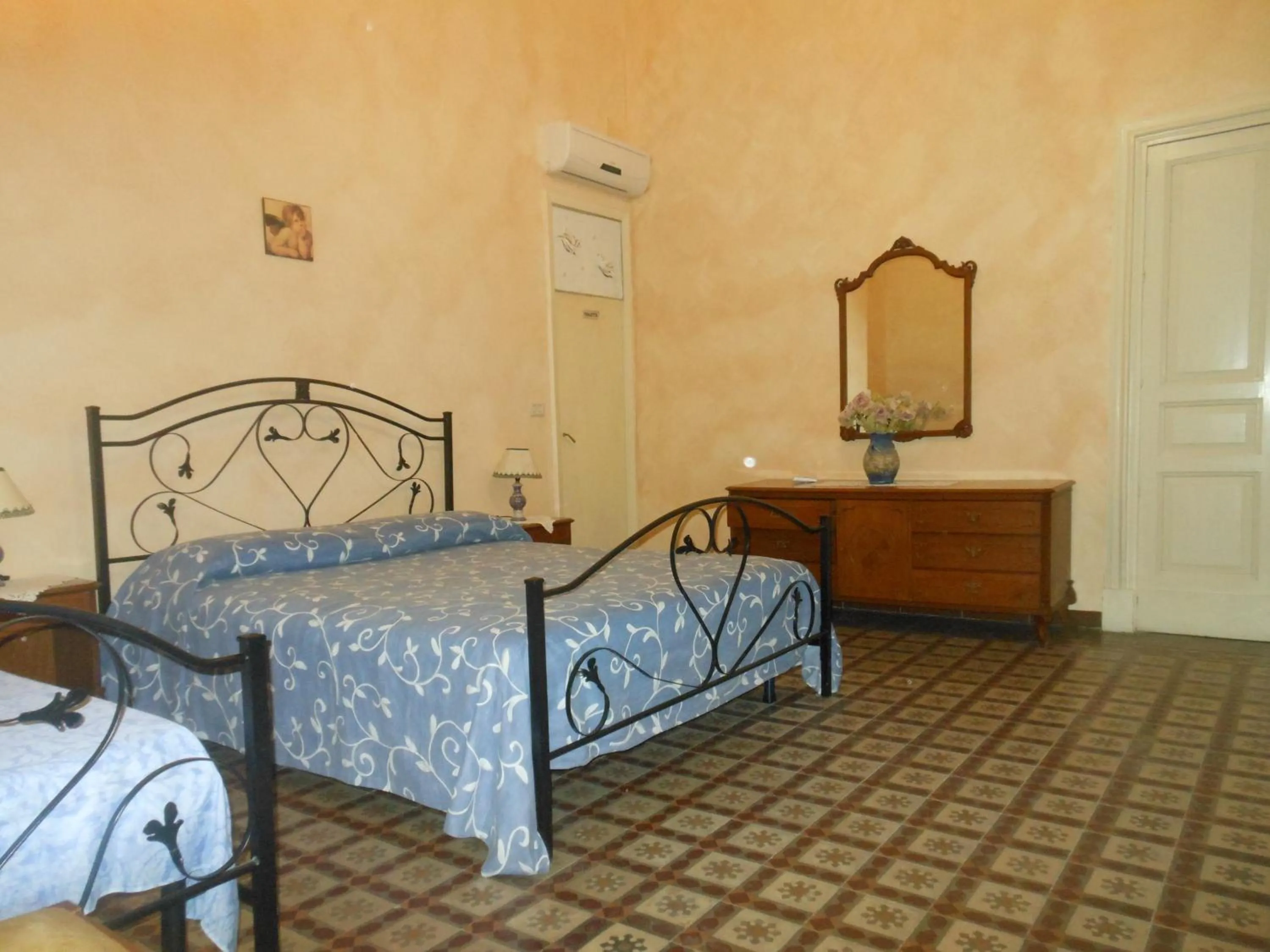 Decorative detail, Bed in Etna B&B