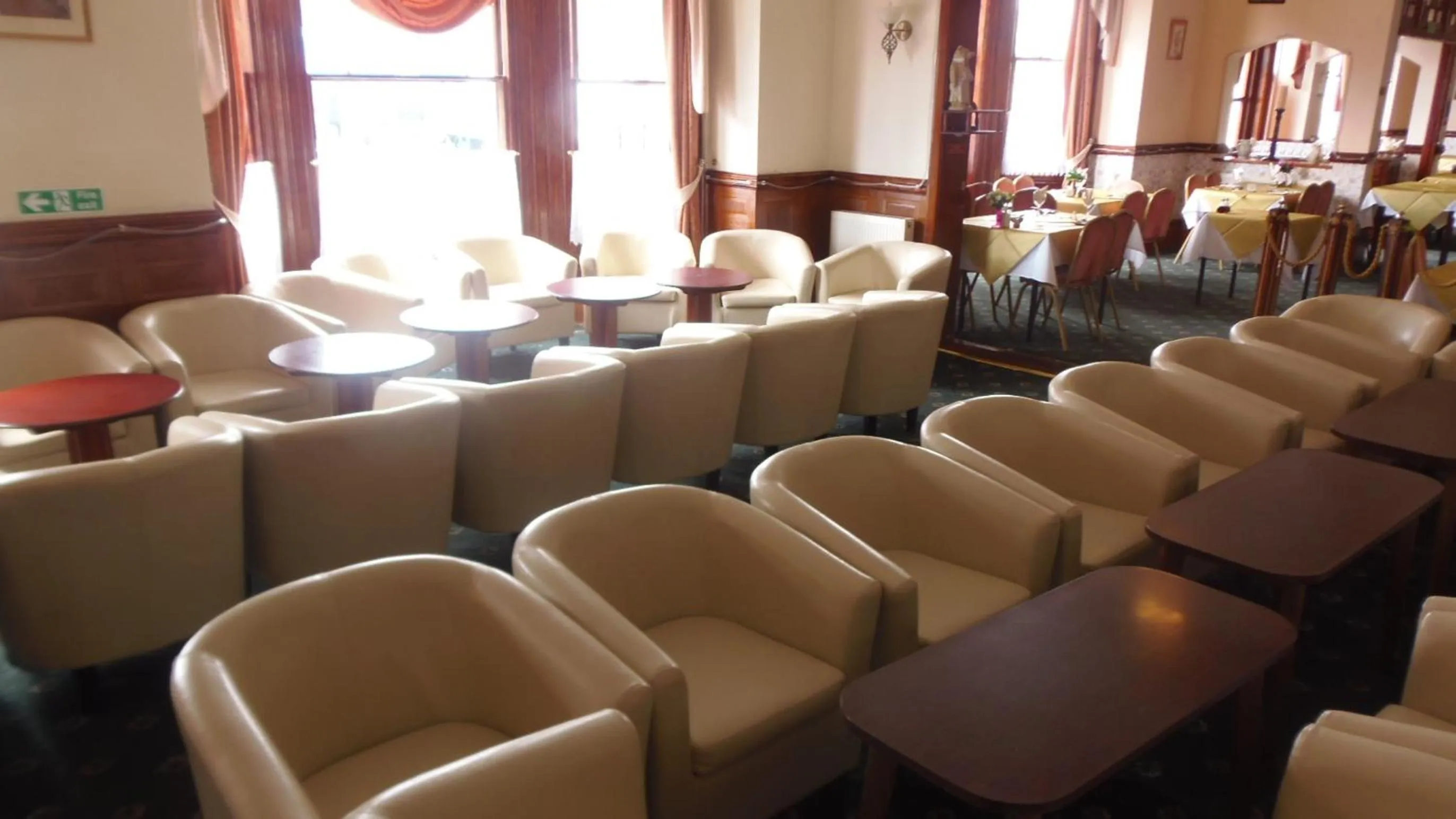 Communal lounge/ TV room in St George Hotel Great Yarmouth