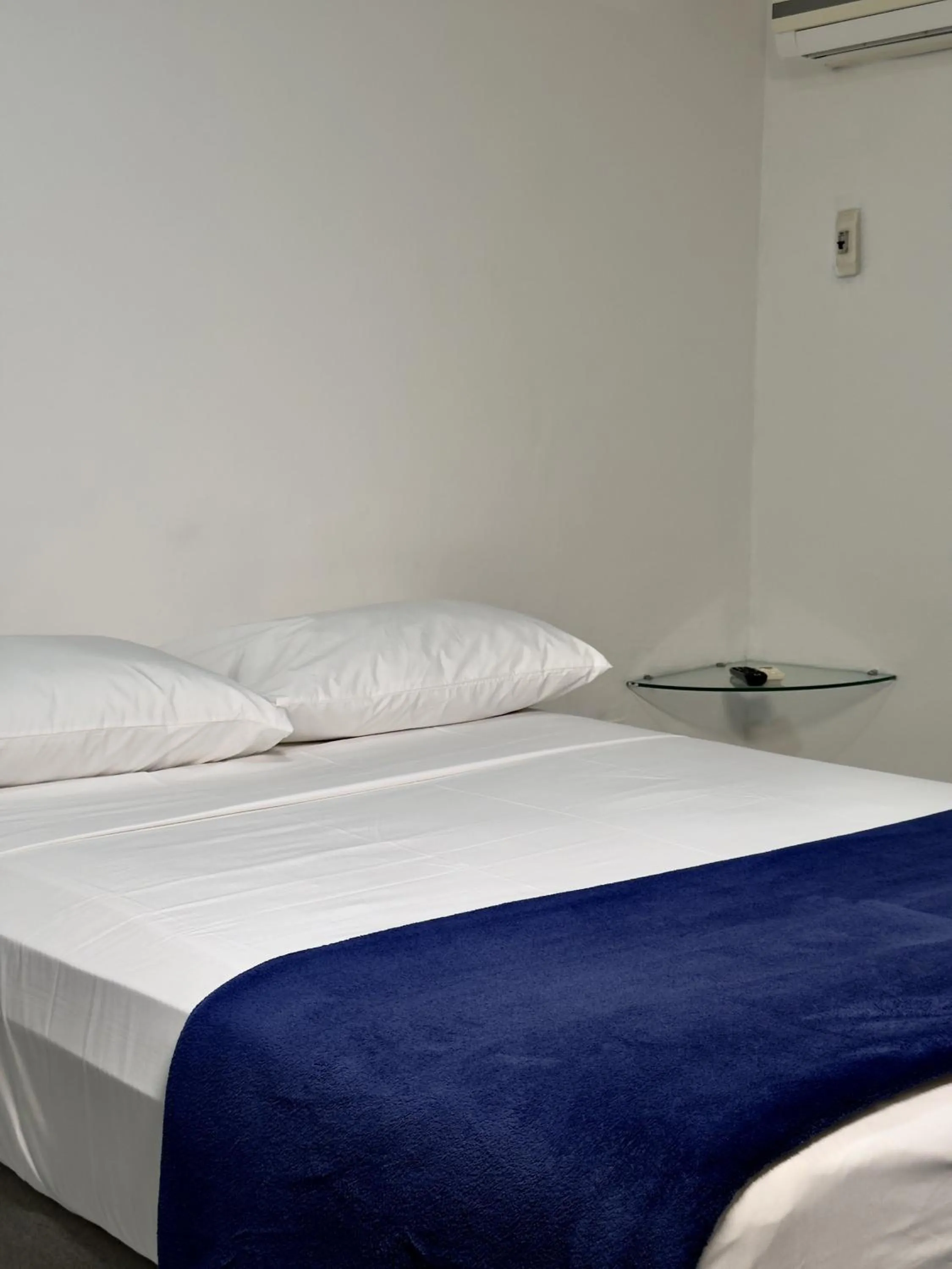 Bed in Las Brisas Beach Hotel