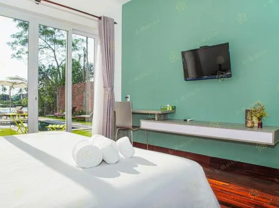 Bed in Ylang Garden Villa