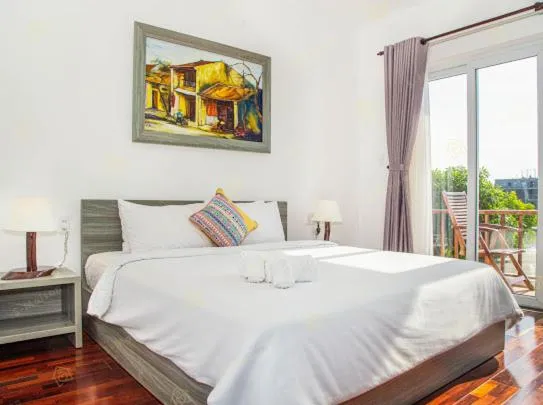 Bed in Ylang Garden Villa