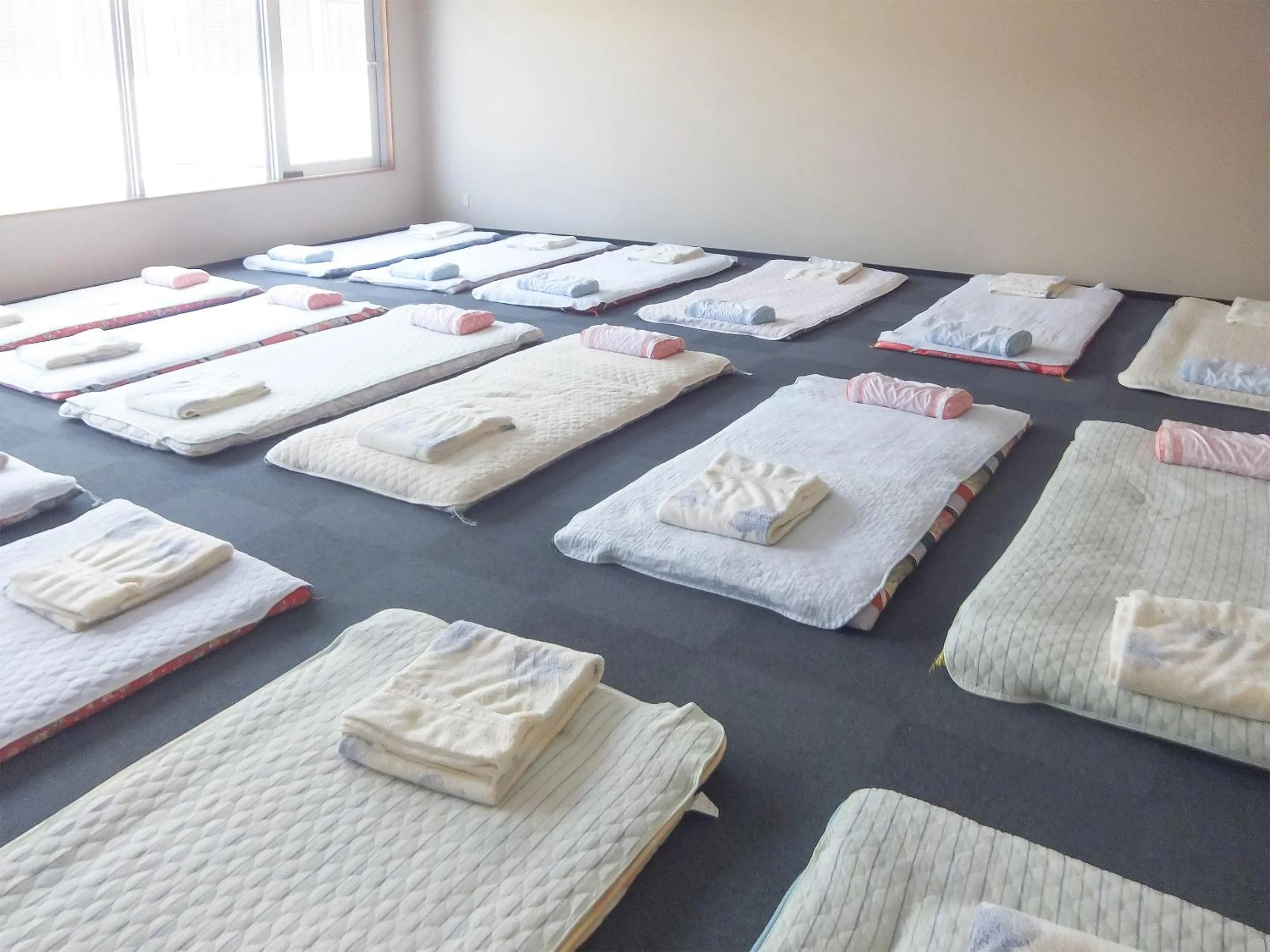Photo of the whole room, Bed in Natural Onsen Hostel Hidamari no Yu