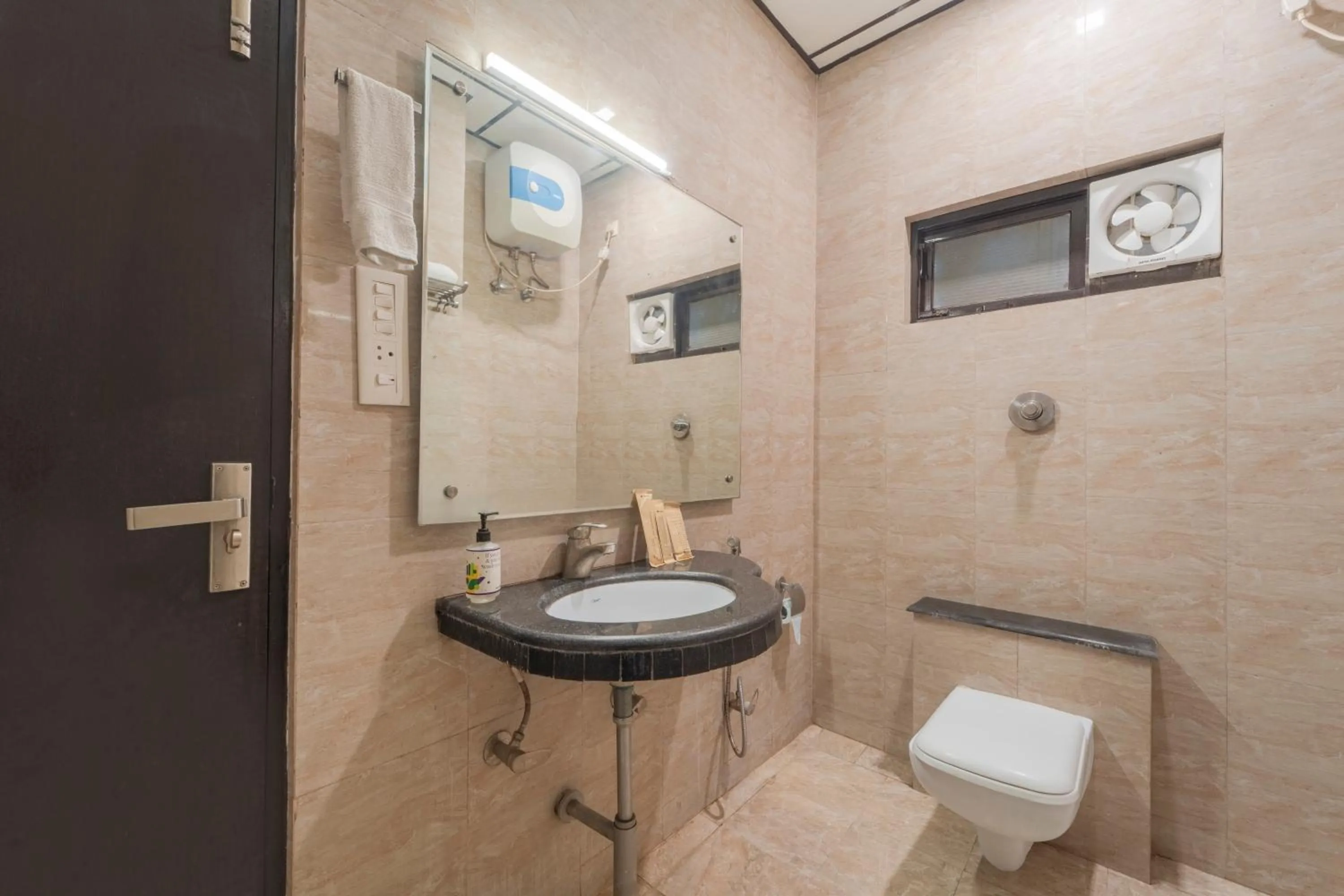 Bathroom in Treebo Shivam Inn Near Singapore Mall