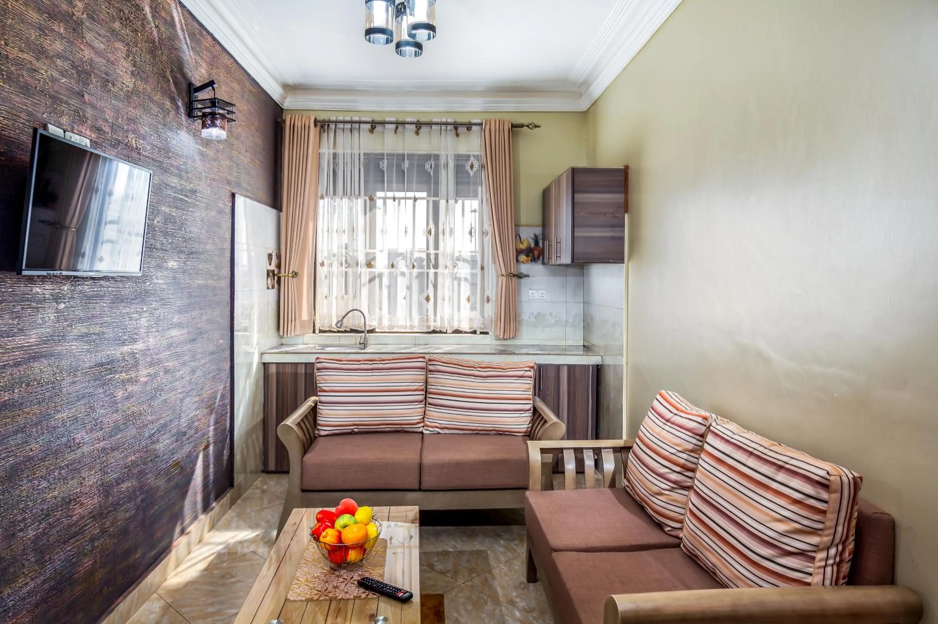 Communal lounge/ TV room in Keba Xpress Hotel - Entebbe